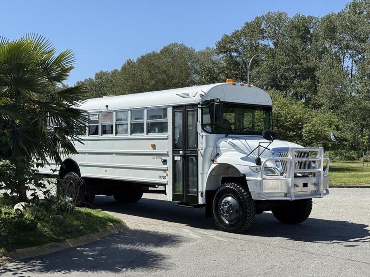 This 2009 International 3000 CE 33-passenger bus is powered by a 7.6L 6-cylinder diesel engine paired with an automatic transmission and equipped with a Marmon Herrington all-wheel-drive conversion, creating a specialized passenger bus suited for demanding road, industrial, or remote access environments.Its 4x4 system includes locking front hubs, a high/low transfer case, front axle disconnect, and a master switch, providing enhanced traction and off-road capability beyond a standard passenger bus configuration.

Additional equipment includes a Webasto heater, cruise control, engine brake, automatic entry step, air suspension, CB radio, and onboard TV. Finished in white with a gray vinyl interior, this 33-passenger bus offers a unique combination of passenger capacity and all-terrain capability, making it well suited for workforce transport, remote site shuttle use, or specialty commercial applications. Transport dimensions are approximately 40 feet long and 11 feet 6 inches high. This item is currently OFFSITE. You must register an appointment with our office to schedule an offsite viewing. Appointments must be made a minimum of one business day in advance (and as defined by the days that Repo.com is open for business) before your appointment can be scheduled and confirmed. We may, at our own discretion, instead opt to transport smaller items to Repo.coms main yard for viewing purposes.  $89,990.00 plus $375 processing fee, $90,365.00 total payment obligation before taxes.   Listing report, warranty, contract commitment cancellation fee, financing available on approved credit (some limitations and exceptions may apply). All above specifications and information is considered to be accurate but is not guaranteed and no opinion or advice is given as to whether this item should be purchased. We do not allow test drives due to theft, fraud, acts of vandalism and undetectable impaired driving. Instead we provide the following benefits: Complimentary Warranty (with options to extend), Limited Money Back Satisfaction Guarantee on Fully Completed Contracts, Contract Commitment Cancellation, and an Open-Ended Sell-Back Option. Ask seller for details or call 604-522-REPO(7376) to confirm listing availability.