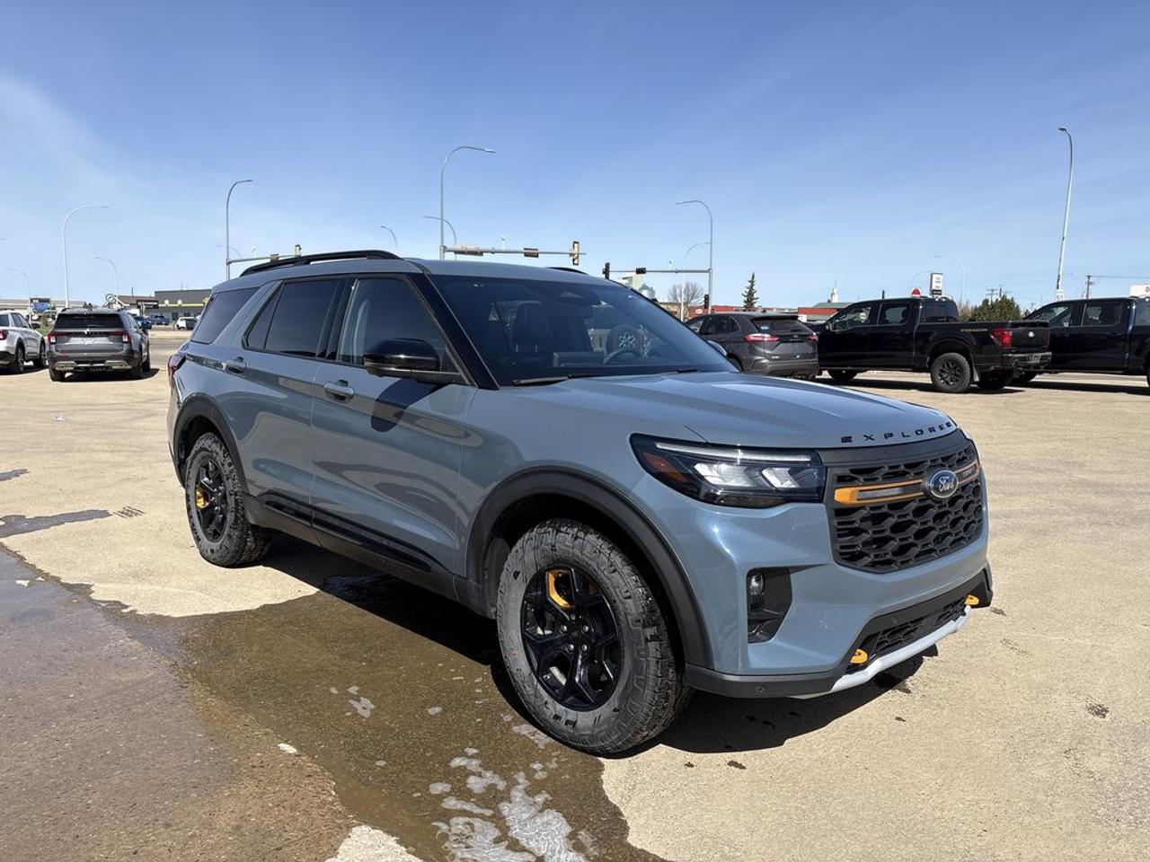 THE PRICE YOU SEE, PLUS GST. GUARANTEED!APPLE CARPLAY/ANDROID AUTO COMPATABLE! PREVIOUS FORD EXECUTIVE DRIVEN VEHICLE!Qualifies for new Finance/Lease rates (OAC)3.0 LITER ECOBOOST V6, 10 SPEED AUTO, TREMOR TRIM(800a), ONYX MILO SUEDE SEATS, HEATED/VENTED FRONT SEATS, 2ND ROW, HEATED SEATS, TREMOR ULTIMATE PKG, MULTI-CONTOUR FRONT SEATS, FIXED PANORAMIC VISTA ROOF, 14 SPEAKER B&O AUDIO, HEATED STEERING WHEEL, BLUECRUISE HARDWARE/EQUIPMENT, CLASS III TRAILER TOW PKG, BLIS.     The 2026 Ford Explorer Tremor offers a formidable combination of power, off-road capability, and premium features, making it an ideal choice for adventure enthusiasts seeking a versatile SUV. Powered by a robust 3.0-liter engine, likely a turbocharged V6, it provides strong performance and towing capacity, ensuring the vehicle can handle both rugged terrains and highway cruising with ease. The Tremor Ultimate Package enhances its off-road prowess with features such as upgraded suspension, skid plates, off-road tires, and possibly a terrain management system tailored for challenging environments. This package is designed to maximize the vehicles ability to conquer dirt trails, rocks, and uneven surfaces while maintaining comfort and stability. The 800A package signifies a high level of luxury and technology, offering premium interior amenities like leather upholstery, advanced infotainment systems, driver assistance features, and other modern conveniences. Overall, the 2026 Ford Explorer Tremor with these packages combines muscular performance, off-road readiness, and upscale comfort, making it a highly capable and stylish SUV for both adventurous and everyday driving.Do you want to know more about this vehicle, CALL, CLICK OR COME ON IN!*AMVIC Licensed Dealer; CarFax and Full Mechanical Inspection Included.