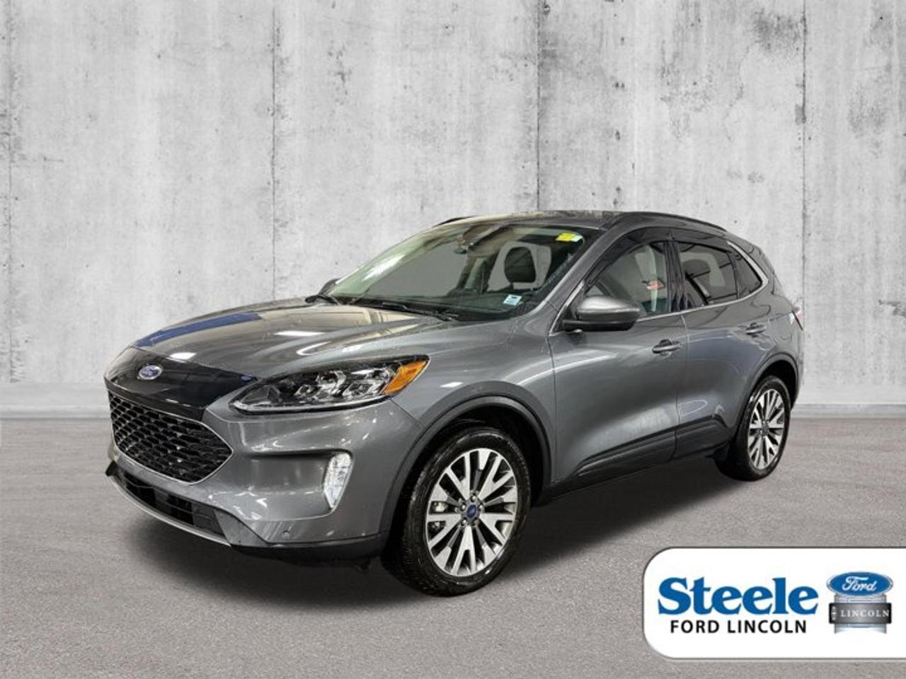 Recent Arrival!Carbonized Gray Metallic2022 Ford Escape Hybrid TitaniumAWD eCVT 2.5L iVCTVALUE MARKET PRICING!!, 2.5L iVCT.ALL CREDIT APPLICATIONS ACCEPTED! ESTABLISH OR REBUILD YOUR CREDIT HERE. APPLY AT https://steeleadvantagefinancing.com/6198 We know that you have high expectations in your car search in Halifax. So if youre in the market for a pre-owned vehicle that undergoes our exclusive inspection protocol, stop by Steele Ford Lincoln. Were confident we have the right vehicle for you. Here at Steele Ford Lincoln, we enjoy the challenge of meeting and exceeding customer expectations in all things automotive.