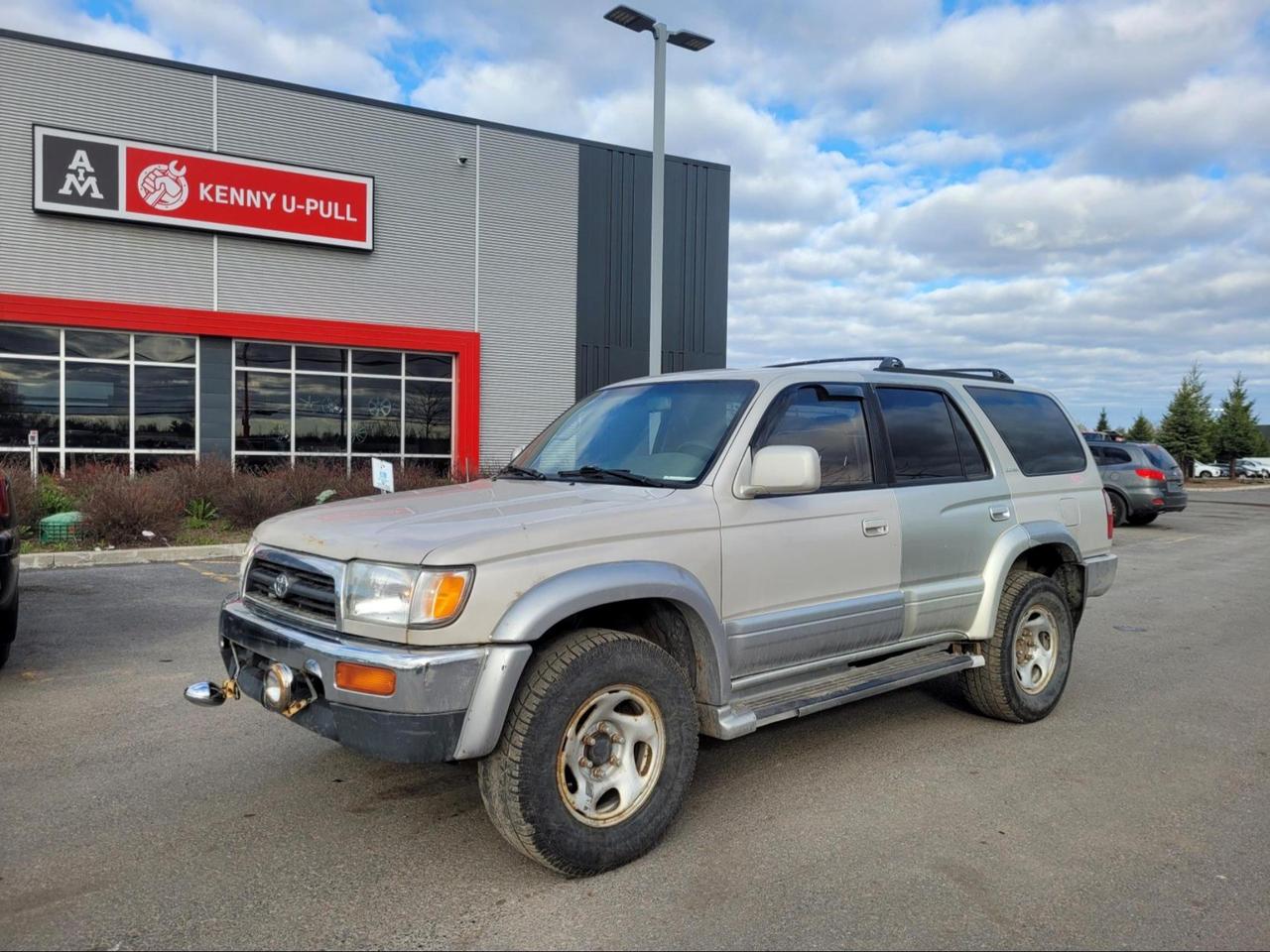 1998 Toyota 4 Runner Limited in Desert Dune Pearl. The vehicle has 390,463km. The vehicle runs and drives. Check engine light is on. Some rust spots and Imperfections around the vehicle. Some rips in the interior. We dont perform any mechanical/safety inspections. The vehicle is sold as is and might need some work.