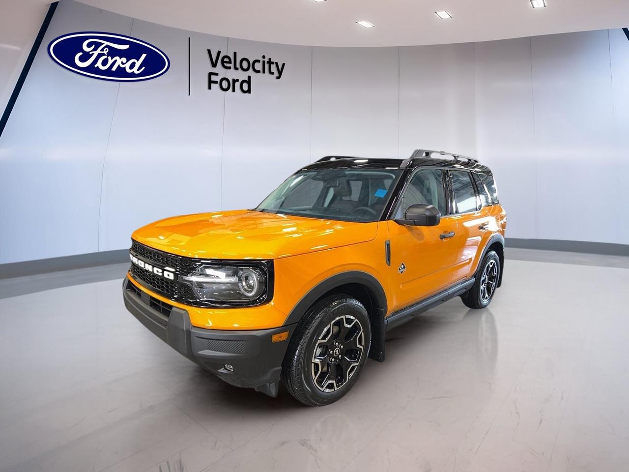 Built for daily comfort and weekend adventure, this brand new 2026 Ford Bronco Sport Outer Banks 4x4 brings smart utility, confident traction, and modern style to every drive in Moose Jaw. Its orange exterior adds bold character, while the black interior keeps the cabin clean and timeless.

With four doors, an automatic transmission, and a 1.5-litre unleaded engine, this 2026 Ford Bronco Sport Outer Banks 4x4 is easy to enjoy in every season. Four-wheel drive adds extra confidence on changing road surfaces, and the feature list focuses on the items drivers use most every day.

FEATURES OF THE Bronco Sport Outer Banks 4x4

»» Orange exterior with bold SUV presence
»» Four-wheel drive for year-round confidence
»» Eight-speed automatic for smooth shifting
»» Brand new condition for fresh ownership

ADVANCED SAFETY FEATURES

»» Anti-lock braking system helps controlled stops
»» Stability control supports confident road handling
»» Backup camera aids reversing and parking
»» Blind spot monitor adds lane awareness

PERFORMANCE AND EFFICIENCY

»» 1.5-litre unleaded engine balances daily efficiency
»» Automatic transmission delivers smooth power response
»» Four-wheel drive improves traction on roads
»» Cruise control supports relaxed highway travel

COMFORT AND CONVENIENCE

»» Heated front seats add cold-weather comfort
»» Dual-zone climate control helps cabin comfort
»» Remote starter warms vehicle before driving
»» Power windows simplify everyday cabin use

Inside, this 2026 Ford Bronco Sport Outer Banks 4x4 is set up for comfort and ease. Heated front seats, front air conditioning, and automatic climate control help keep the cabin pleasant in changing Canadian weather. The adjustable steering wheel and driver lumbar support also help create a more tailored driving position.

TECHNOLOGY AND CONNECTIVITY

»» Bluetooth integration supports hands-free phone use
»» Wi-Fi hotspot keeps devices connected
»» Satellite radio expands entertainment choices
»» Steering wheel audio controls add convenience

CARGO SPACE

»» Rear trunk access improves loading ease
»» Four-door layout supports passenger flexibility
»» Useful cargo area suits daily errands
»» SUV design helps versatile storage needs

This 2026 Ford Bronco Sport Outer Banks 4x4 also adds practical touches that make daily driving easier. Push button start, heated mirrors, electric mirrors, memory mirrors, automatic headlights, and a rear window defroster all work together to support simple, stress-free use through the year.

Driver-focused features help this SUV feel polished on the road. Power steering, a driver power seat, power passenger seat, memory seats, tinted windows, fog lights, LED headlamps, and an auto-dimming rearview mirror all add convenience and confidence without overcomplicating the experience.

WHAT OTHER OWNERS LIKE

»» Easy entry size for urban driving
»» Confident all-weather traction from four-wheel drive
»» Comfortable ride for daily commuting
»» Practical cargo room for active lifestyles

Offered by Velocity Ford in Moose Jaw, this brand new SUV delivers the right mix of utility, comfort, and everyday technology. For drivers who want a capable Ford with modern essentials, this Bronco Sport is ready to make every trip easier and more enjoyable.

This 2026 Ford Bronco Sport Outer Banks 4x4s VIN is: 3FMCR9CN4TRE51611.