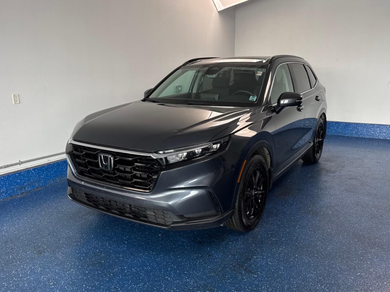 New Price! 2023 Honda CR-V Sport AWD Sport | One Owner | Sunroof | Zacks Certified. CVT AWD Canyon River Blue Metallic 1.5L I4 Turbocharged DOHC 16V LEV3-ULEV50 190hp<br /><br /><br />AWD, 6 Speakers, Air Conditioning, Alloy wheels, Apple CarPlay/Android Auto, Automatic temperature control, Electronic Stability Control, Exterior Parking Camera Rear, Fabric Seating Surfaces, Forward collision: Collision Mitigation Braking System (CMBS) + FCW mitigation, Fully automatic headlights, Heated door mirrors, Heated Front Bucket Seats, Heated front seats, Heated steering wheel, Leather Shift Knob, Leather steering wheel, Passenger door bin, Power driver seat, Power Liftgate, Power moonroof, Power windows, Radio: AM/FM Audio System, Remote keyless entry, Split folding rear seat, Tilt steering wheel, Turn signal indicator mirrors, Variably intermittent wipers, Wheels: 18''' Black Aluminum-Alloy.<br /><br />Certification Program Details: Fresh 2 Yr MVI | 30 day warranty* | 110 point inspection | Full tank of fuel | Krown rustproofed | Flexible financing options | Professionally detailed<br /><br />This vehicle is Zacks Certified! You're approved! We work with you. Together we'll find a solution that makes sense for your individual situation. Please visit us or call 902 843-3900 to learn about our great selection.<br /><br />With 22 lenders available Zack's Auto Sales can offer our customers with the lowest available interest rate. Thank you for taking the time to check out our selection!