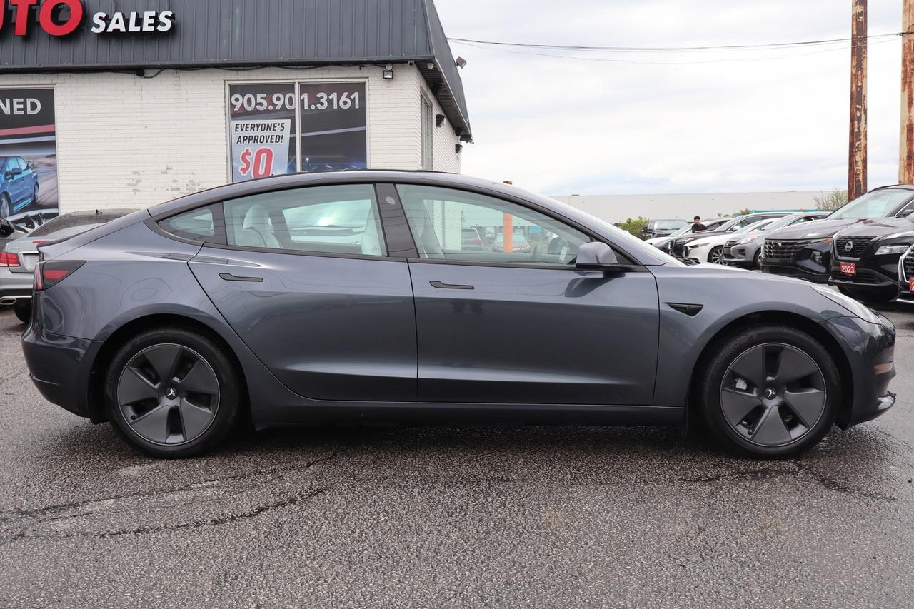 2023 Tesla Model 3 Standard Range Plus   No Accident   White Interior Photo