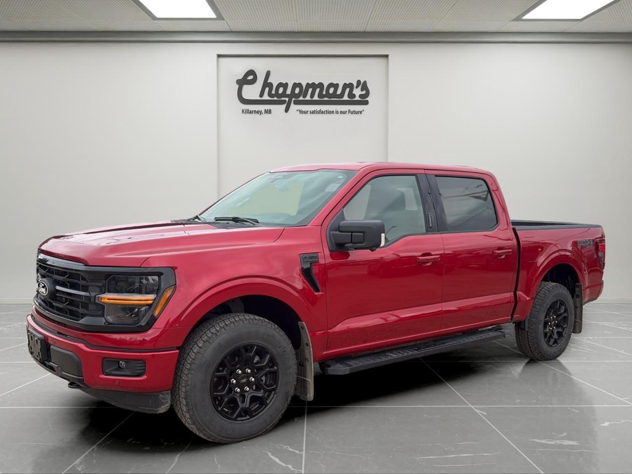 <p>Finished in Red with a Black interior, this 2024 Ford F-150 XLT SuperCrew combines modern technology, EcoBoost performance, and full-size truck capability in a versatile package. With its spacious SuperCrew cab and strong towing capability, its built for both work and everyday driving.</p><p>Powered by a 2.7L EcoBoost V6 engine paired with an automatic transmission, this F-150 delivers responsive performance with excellent efficiency for a full-size truck. Equipped with 4WD, a Class IV towing package, and advanced driver assistance features, its ready for towing, hauling, and year-round driving confidence.</p><h3>Performance & Capability</h3><ul><li><p>2.7L EcoBoost V6 engine</p></li><li><p>Automatic transmission with selectable drive modes</p></li><li><p>4WD with electronic transfer case</p></li><li><p>Class IV towing package</p></li><li><p>Trailer sway control</p></li><li><p>Trailer wiring harness</p></li><li><p>Hill hold control</p></li><li><p>Heavy-duty gas-pressurized shocks</p></li><li><p>36-gallon fuel tank</p></li><li><p>Auto start-stop technology</p></li></ul><h3>Interior Comfort & Convenience</h3><ul><li><p>Spacious SuperCrew cab configuration</p></li><li><p>Dual-zone automatic climate control</p></li><li><p>Leatherette-wrapped steering wheel</p></li><li><p>Fold-up rear bench seating</p></li><li><p>Locking underseat storage</p></li><li><p>Connected navigation system</p></li><li><p>Keypad entry system</p></li><li><p>Front centre console with storage</p></li><li><p>Rear underseat storage compartments</p></li></ul><h3>Technology & Connectivity</h3><ul><li><p>FordPass Connect with 5G Wi-Fi hotspot capability</p></li><li><p>Connected navigation with voice activation</p></li><li><p>Driver information display</p></li><li><p>Multiple camera views including cargo bed camera</p></li><li><p>Steering wheel-mounted cruise and audio controls</p></li><li><p>USB and 12V power connectivity</p></li></ul><h3>Safety & Driver Assistance</h3><ul><li><p>BLIS blind spot monitoring</p></li><li><p>Pre-collision assist with automatic emergency braking</p></li><li><p>Reverse brake assist</p></li><li><p>Reverse sensing system</p></li><li><p>360-degree camera system</p></li><li><p>Rearview camera</p></li><li><p>Automatic high beam headlights</p></li><li><p>Tire pressure monitoring system</p></li></ul><h3>Exterior Highlights</h3><ul><li><p>Red exterior finish</p></li><li><p>Chrome front and rear bumpers</p></li><li><p>Chrome door handles</p></li><li><p>Black grille with chrome accents</p></li><li><p>Front fog lamps</p></li><li><p>Cargo bed lighting</p></li><li><p>Integrated tailgate storage</p></li><li><p>Tow hooks</p></li><li><p>Cornering lights</p></li></ul><p>A capable full-size truck that combines EcoBoost performance, advanced towing technology, and modern comfort for both work and everyday driving.</p><p>Price Includes Dealer Fee.</p><p>Price Excludes PST & GST.</p><p>Financing Options Available, Call For More Details.</p> <p><strong>*While every reasonable effort is made to ensure the accuracy of this information, we are not responsible for any error or omissions contained on these pages. Please verify any information in question with Chapman Motors Ltd.</strong></p>