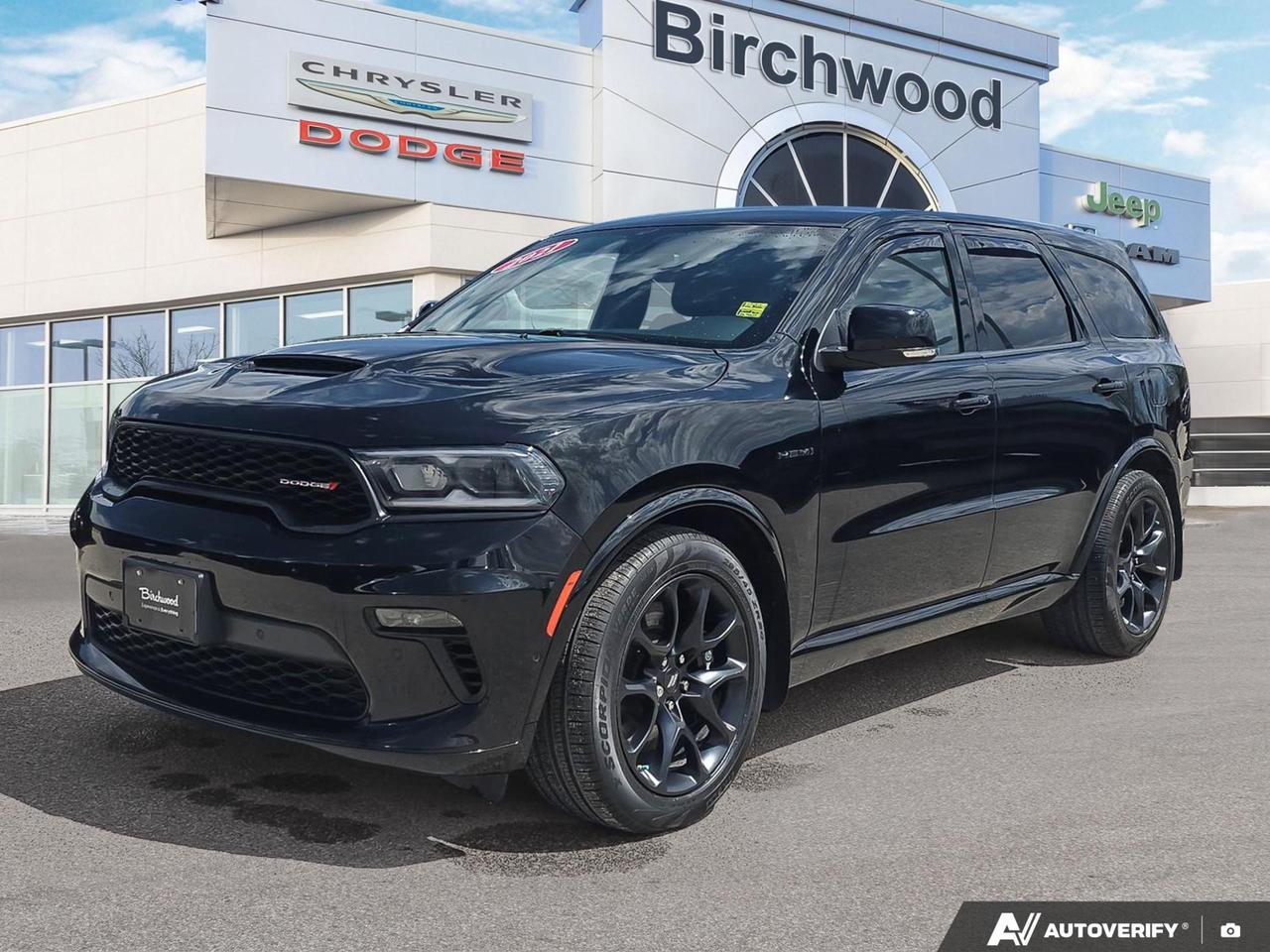 This 2021 Dodge Durango R/T in sleek DB Black is built for drivers who want serious performance and capability without compromise. Powered by the legendary 5.7L HEMI V8 with AWD, and loaded with the Tow N Go Group, Blacktop Package, and 2nd-Row Captain Chairs, this Durango stands apart from a standard trim  its a purpose-built machine for those who demand more from their family hauler.

Key Features:
- 5.7L HEMI V8 engine with AWD  genuine towing and performance capability
- Tow N Go Group package for serious trailering confidence
- Blacktop Package with aggressive blacked-out exterior styling
- 2nd-Row Fold/Tumble Captain Chairs  flexible 7-passenger seating with premium comfort
- Sport Heated Leather Steering Wheel with cruise controls
- 4G LTE Wi-Fi Hotspot keeps everyone connected on the road
- ParkView Backup Camera plus ParkSense Front and Rear Parking Sensors
- Auto LED projector headlamps with automatic high-beams
- Power Liftgate for hands-free rear cargo access
- Heated, auto-dimming, body-coloured power side mirrors with turn signals

At 97,968 km, this Durango R/T has been broken in and is ready for its next chapter. Visit us at Birchwood Chrysler Dodge Jeep Ram or browse online at birchwoodchrysler.ca to reserve this vehicle, start your purchase, or book a test drive. Have questions? Our team is ready to help  reach out anytime.
With us, Experience is Everything. Complete as much or as little of your purchase online as you like. All pricing is what you see is what you pay. No hidden fees. On our website you can choose payment options and terms knowing these are transparent and accurate.

Start your purchase online to build your exact pricing to your specifics like how much money down, vehicle trade and any accessories or added optional protection that suits your needs.

Any questions let us know by calling (204) 774-4444, wed love to send you a video to clarify any questions about a vehicle!

Visit us in store at 90-3965 Portage Ave in the Birchwood Autopark.

Dealer permit #5686
Dealer permit #5686