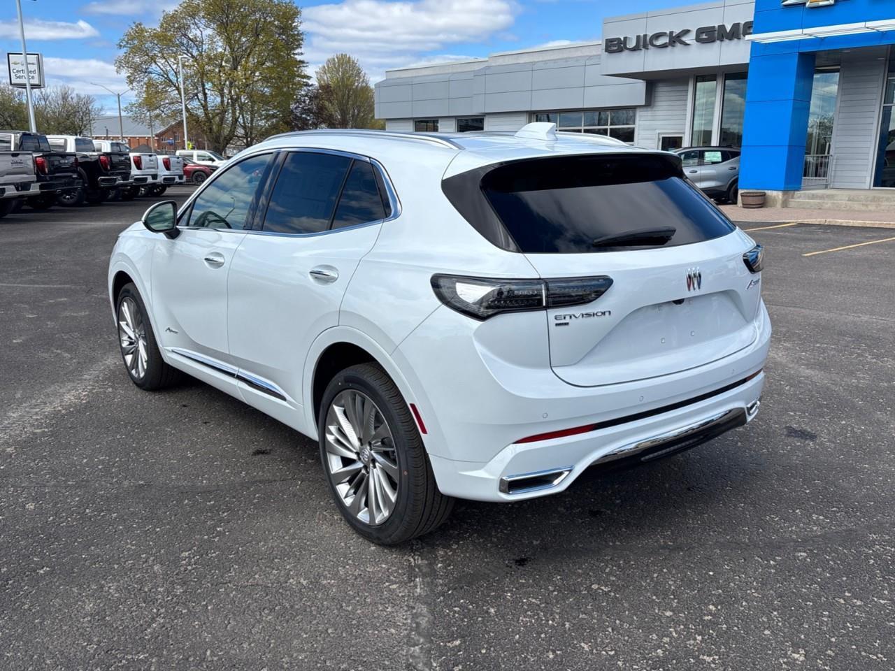 2026 Buick Envision Avenir New 2026 Luxurious 5 Passenger AWD SUV with 20 Pearl Nickel Alloy Wheels, Panoramic Sunroof, Head-Up Drivers Display, Heated and Cooled Front Seats, Heated Second Row Outboard Seats, Drivers Message S Photo