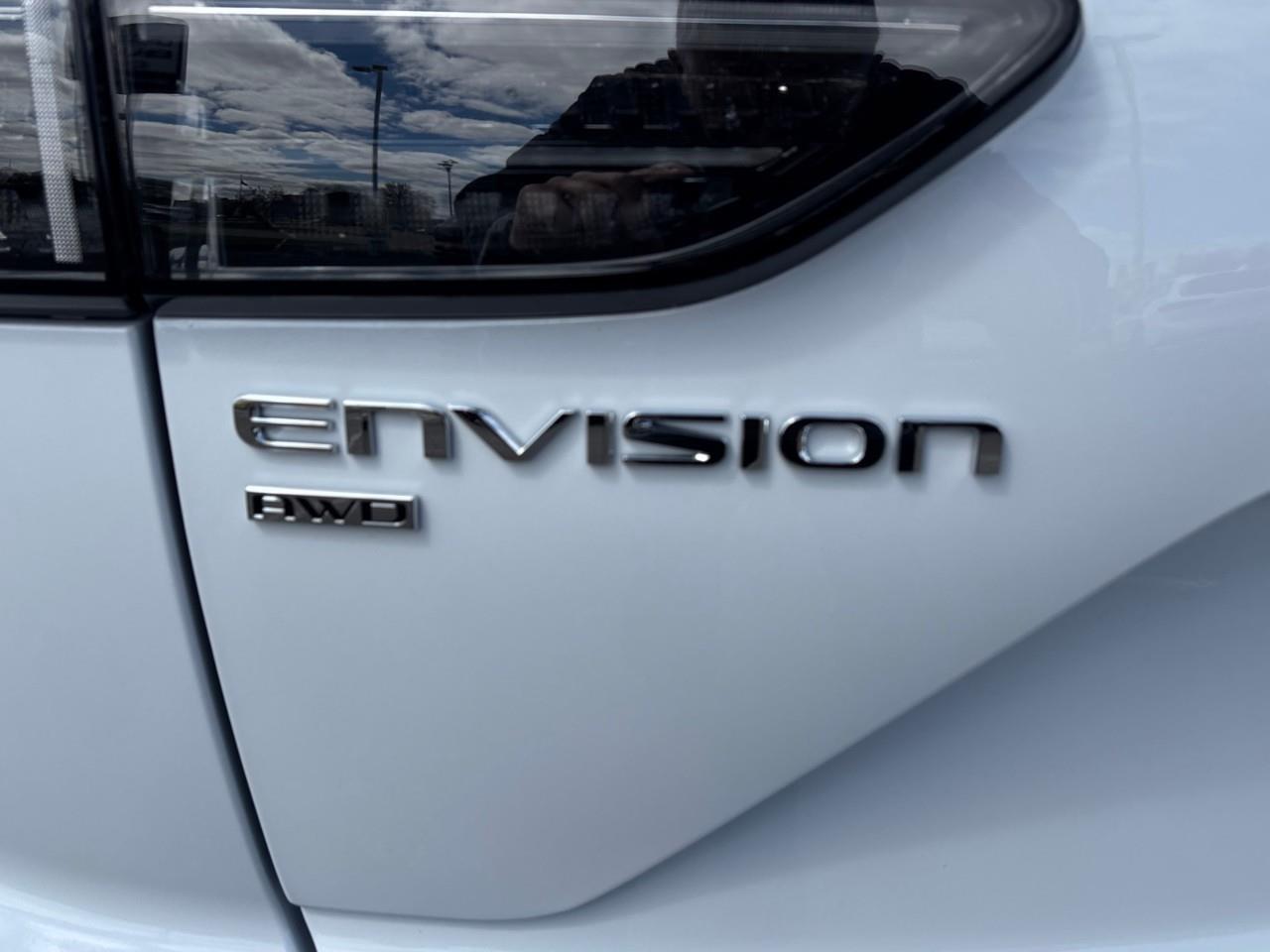 2026 Buick Envision Avenir New 2026 Luxurious 5 Passenger AWD SUV with 20 Pearl Nickel Alloy Wheels, Panoramic Sunroof, Head-Up Drivers Display, Heated and Cooled Front Seats, Heated Second Row Outboard Seats, Drivers Message S Photo