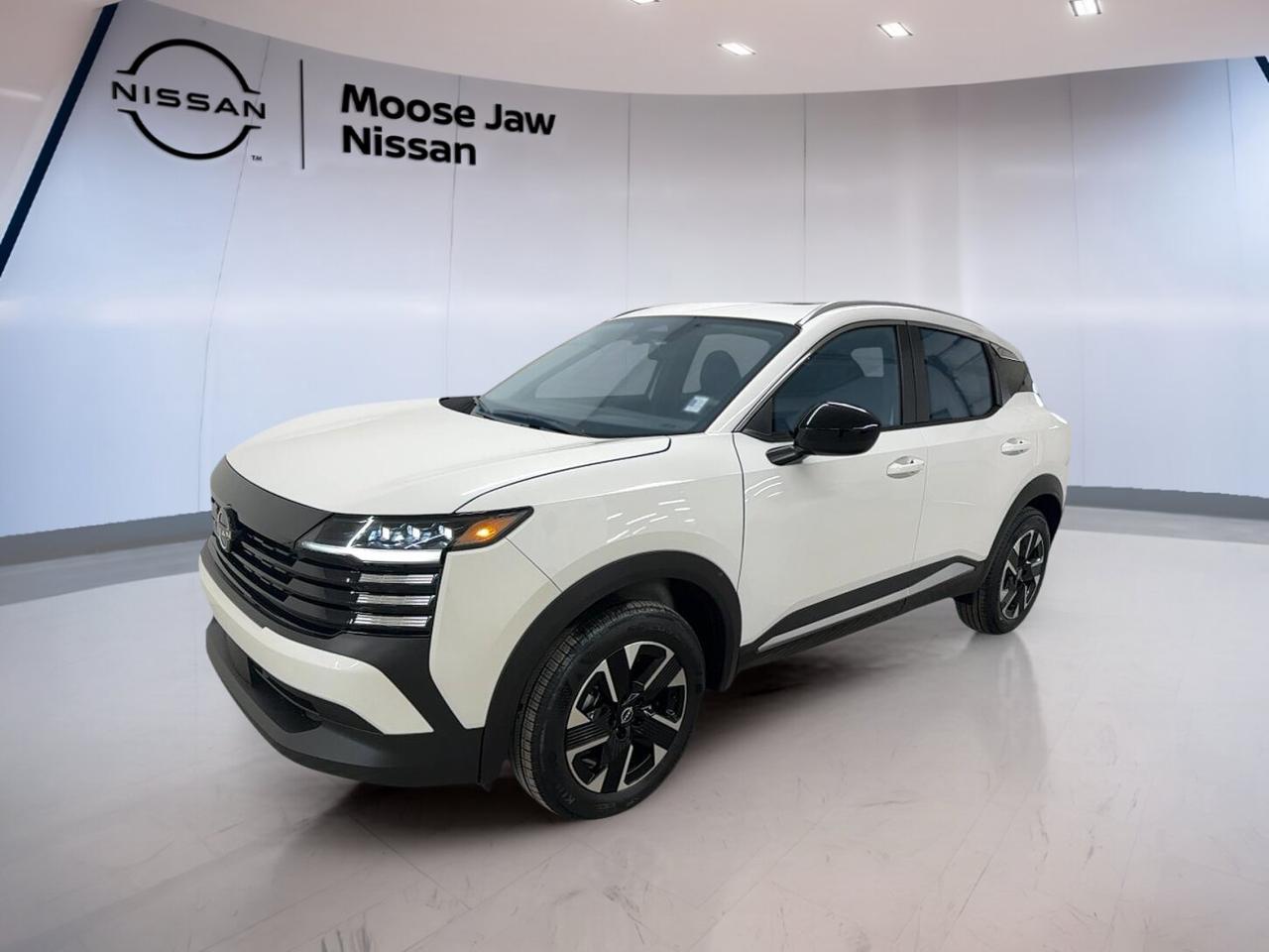 Discover a fresh, confident drive in the brand new 2026 Nissan Kicks SV at Moose Jaw Nissan in Moose Jaw. Finished in White with a Black interior, this compact crossover pairs everyday versatility with smart design. The 2026 Nissan Kicks SV also brings all-wheel drive, a 2.0-litre DOHC 4-cylinder engine, and Xtronic CVT smoothness for easy travel.

FEATURES OF THE Kicks SV

»» White exterior with clean modern presence
»» Black interior with smart cabin layout
»» Xtronic CVT for smooth daily driving
»» All-wheel drive for added confidence

ADVANCED SAFETY FEATURES

»» Nissan safety design supports daily confidence
»» Stable handling helps in changing conditions
»» All-wheel drive adds extra road control
»» Strong body structure supports occupant protection

PERFORMANCE AND EFFICIENCY

»» 2.0-litre four-cylinder engine delivers smooth power
»» Xtronic CVT helps steady fuel use
»» All-wheel drive improves year-round traction
»» Compact size supports easy city driving

COMFORT AND CONVENIENCE

»» Spacious cabin suits daily commuting needs
»» Four-door access makes entry and loading easier
»» Practical layout keeps controls close by
»» Compact crossover shape aids urban parking

TECHNOLOGY AND CONNECTIVITY

»» Clear driver information supports simple operation
»» Well-placed controls improve everyday usability
»» Modern cabin design feels easy to use
»» Smart layout keeps essentials within reach

CARGO SPACE

»» Rear cargo area supports daily errands
»» Flexible space suits groceries and gear
»» Hatchback design helps loading bulky items
»» Compact exterior hides useful interior room

WHAT OTHER OWNERS LIKE

»» Easy manoeuvring in town and parking
»» Useful cargo room for everyday tasks
»» Smooth transmission during regular commuting
»» Confident traction in mixed weather

The brand new 2026 Nissan Kicks SV is made for drivers who want value, flexibility, and comfort in one smart package. Its compact footprint makes it easy to handle in busy streets, while the elevated ride height and practical cabin give it the everyday usefulness many drivers want in Saskatchewan.

With its 2.0-litre DOHC 4-cylinder engine, the 2026 Nissan Kicks SV delivers balanced performance for commuting, errands, and weekend plans. The Xtronic CVT helps provide smooth acceleration and a relaxed driving feel. All-wheel drive adds welcome confidence when roads are wet, snowy, or uneven.

Inside, the 2026 Nissan Kicks SV offers a clean Black interior that feels modern and functional. The cabin is designed to make daily use simple, with sensible control placement and a layout that supports comfort for both driver and passengers. It is a practical choice for active lifestyles.

On the outside, the White finish gives the 2026 Nissan Kicks SV a crisp and contemporary look. Its shape is compact enough for easy parking, yet it still offers the cargo flexibility expected from a crossover. This is a smart new vehicle for drivers who need efficiency, traction, and everyday convenience.

This 2026 Nissan Kicks SVs VIN is: 3N8AP6CB1TL404162.