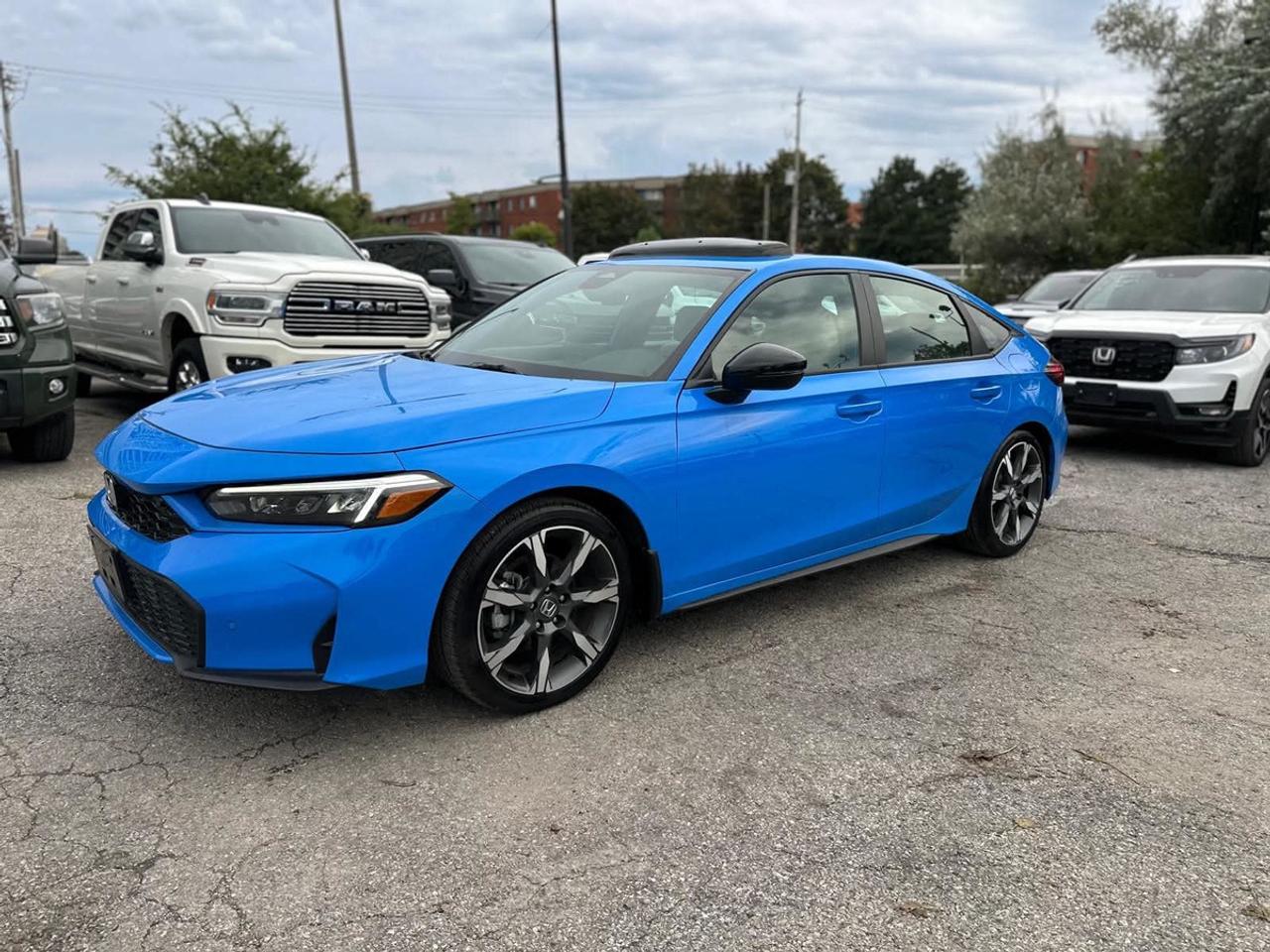 2026 Honda Civic Hybrid Sport Touring Photo2