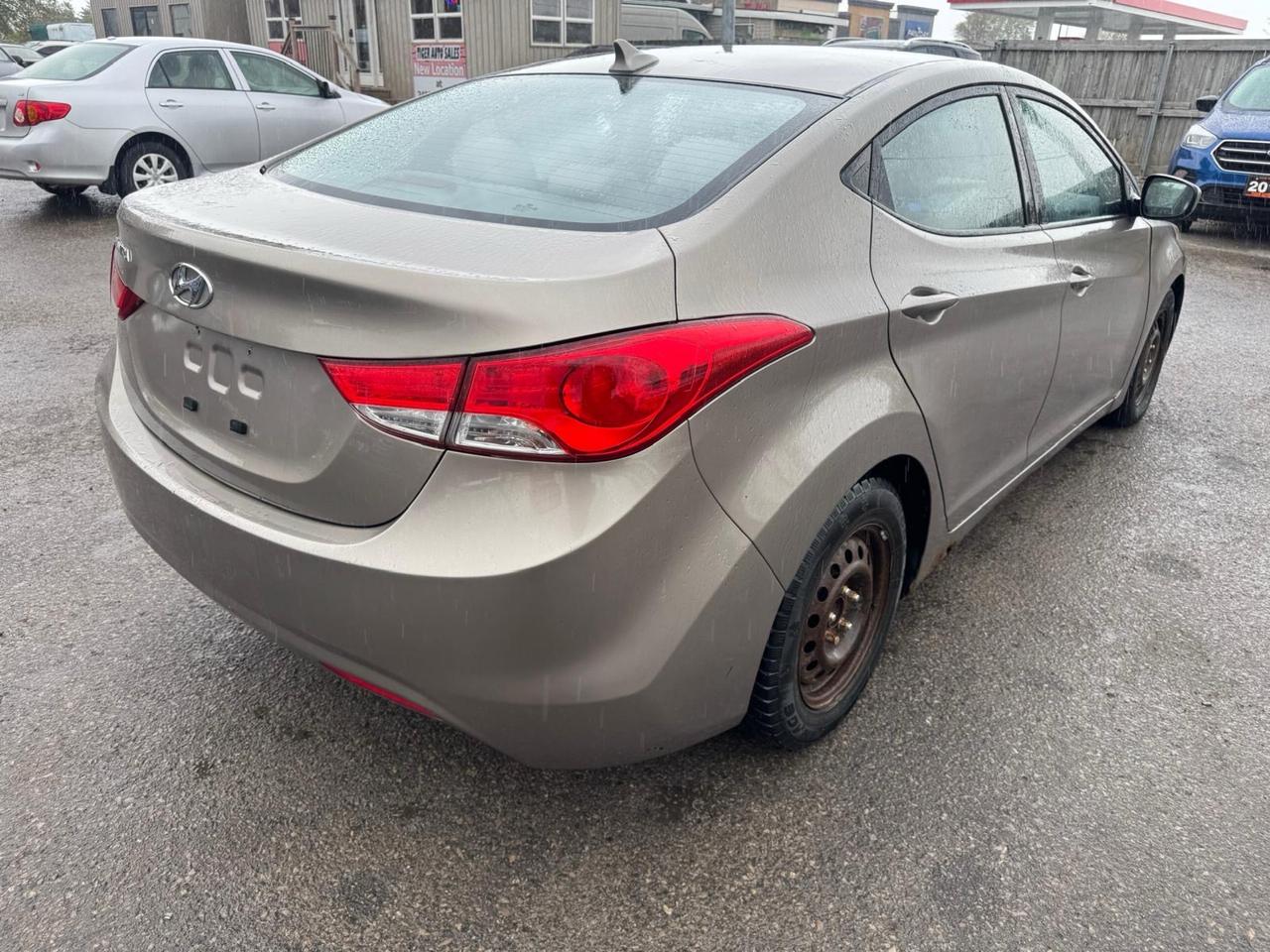 2013 Hyundai Elantra GL, SEDAN, MANUAL, GREAT ON FUEL, AS IS SPECIAL Photo