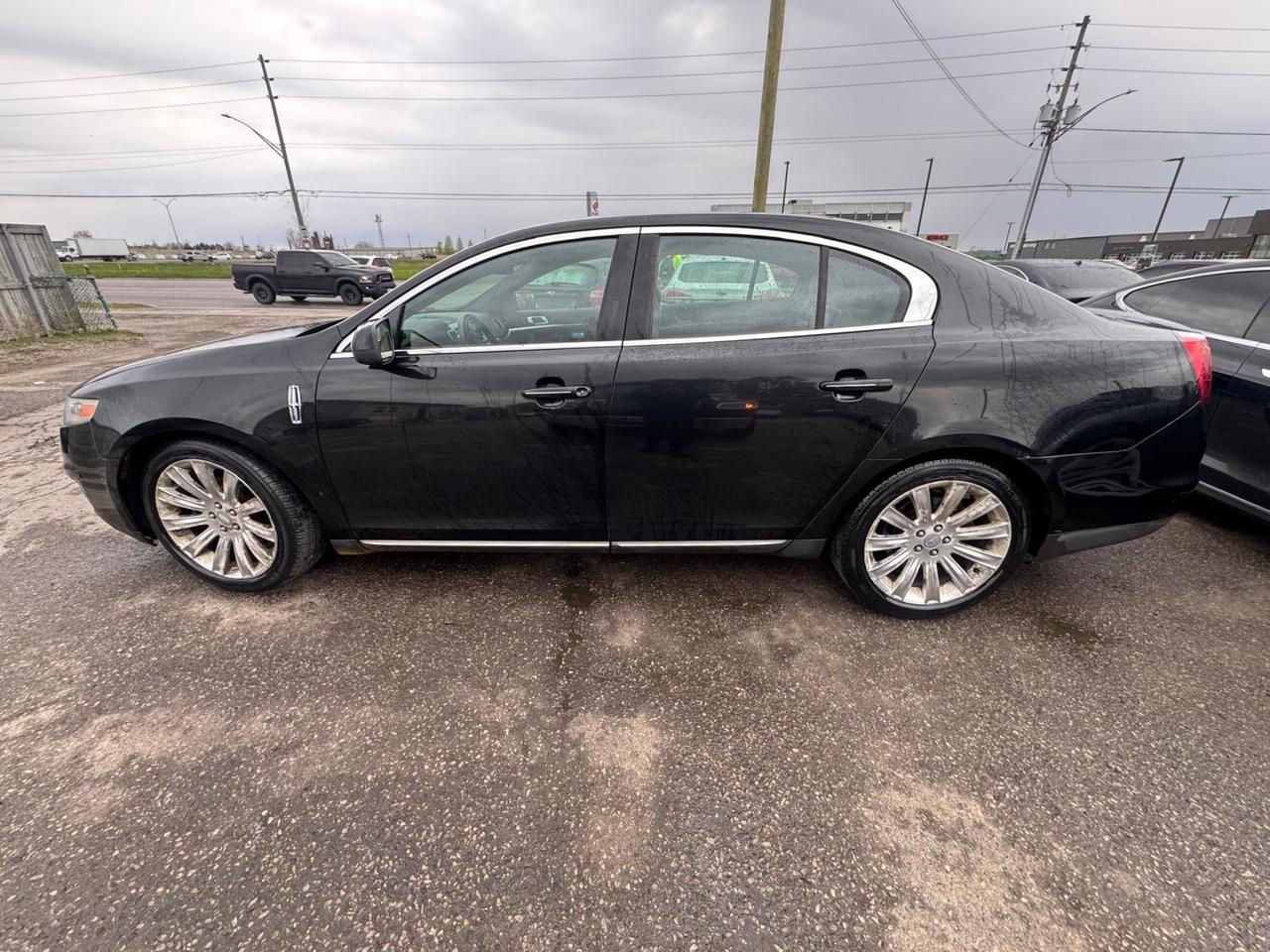 2011 Lincoln MKS SEDAN, AWD, LEATHER, NAVI, LOADED, AS IS SPECIAL Photo
