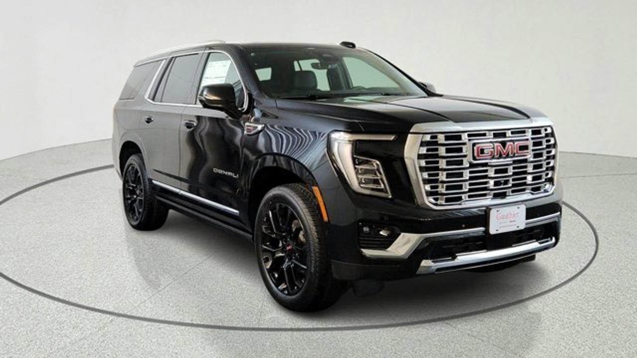 At the heart of this Yukon Denali lies a powerful 6.2L Ecotec3 V8 engine, delivering an impressive 420 horsepower. Paired with a smooth 10-speed automatic transmission and a 4-wheel drive system, this SUV is built to handle diverse road conditions with ease. The inclusion of the Premium Capability Package with Air Ride Adaptive Suspension ensures that every journey remains smooth, whether you are towing heavy gear or driving through uneven terrain.<br />Step inside the spacious Jet Black cabin to discover a world of refinement. The perforated leather seating, heated and ventilated front seats, and a heated steering wheel provide comfort during every season. Technology is integrated seamlessly, featuring a large infotainment touchscreen with Google built-in, wireless Apple CarPlay and Android Auto, and a premium Bose surround-sound system to keep everyone entertained<br />Safety and convenience are paramount in this model. Equipped with a suite of advanced driver-assistance features, including Adaptive Cruise Control, Enhanced Automatic Emergency Braking, and HD Surround Vision, you can drive with confidence. Practical additions like the hands-free power liftgate and power-folding third-row seats make loading cargo and passengers effortless.