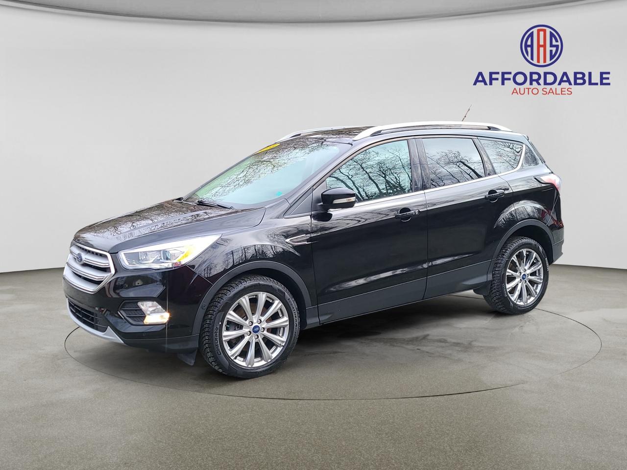 <p><strong>Affordable Auto Sales</strong><br><strong>Affordable 2018 Ford Escape Titanium 4X4! Full leather interior!</strong><br><strong>&nbsp;</strong><br><em><strong>KEY HIGHLIGHTS!!!</strong></em><br>Great Deal + Easy Financing Available!<br>We price all of our vehicles below market value for a quick sale! Cash or financing options are available for qualified buyers.<br>&nbsp; &nbsp; &bull; &nbsp; &nbsp;Automatic Transmission<br>&nbsp; &nbsp; &bull; &nbsp; &nbsp;Auto, 4WD, 2L 4cyl, Gas<br>&nbsp; &nbsp; &bull; &nbsp; &nbsp;Fresh oil change, or like-new oil.<br>&nbsp; &nbsp; &bull; &nbsp; &nbsp;Tires to match the season!<br>&nbsp; &nbsp; &bull; &nbsp; &nbsp;30 DAY Powertrain Warranty with Extended Options Available<br>&nbsp; &nbsp; &bull; &nbsp; &nbsp;146,000 Kilometres!<br>&nbsp; &nbsp; &bull; &nbsp; &nbsp;Brand new 2-year inspection &ndash; Fully certified!<br>&nbsp; &nbsp; &bull; &nbsp; &nbsp;Delivery available anywhere in Atlantic Canada!</p><p><br><em><strong>FINANCING AVAILABLE!!!</strong></em></p><p>Submit Your Application at www.affordableautosales.ca (http://www.affordableautosales.ca/)</p><p>Call / Text: 902-890-9423<br>Email: info@affordableautosales.ca</p>
