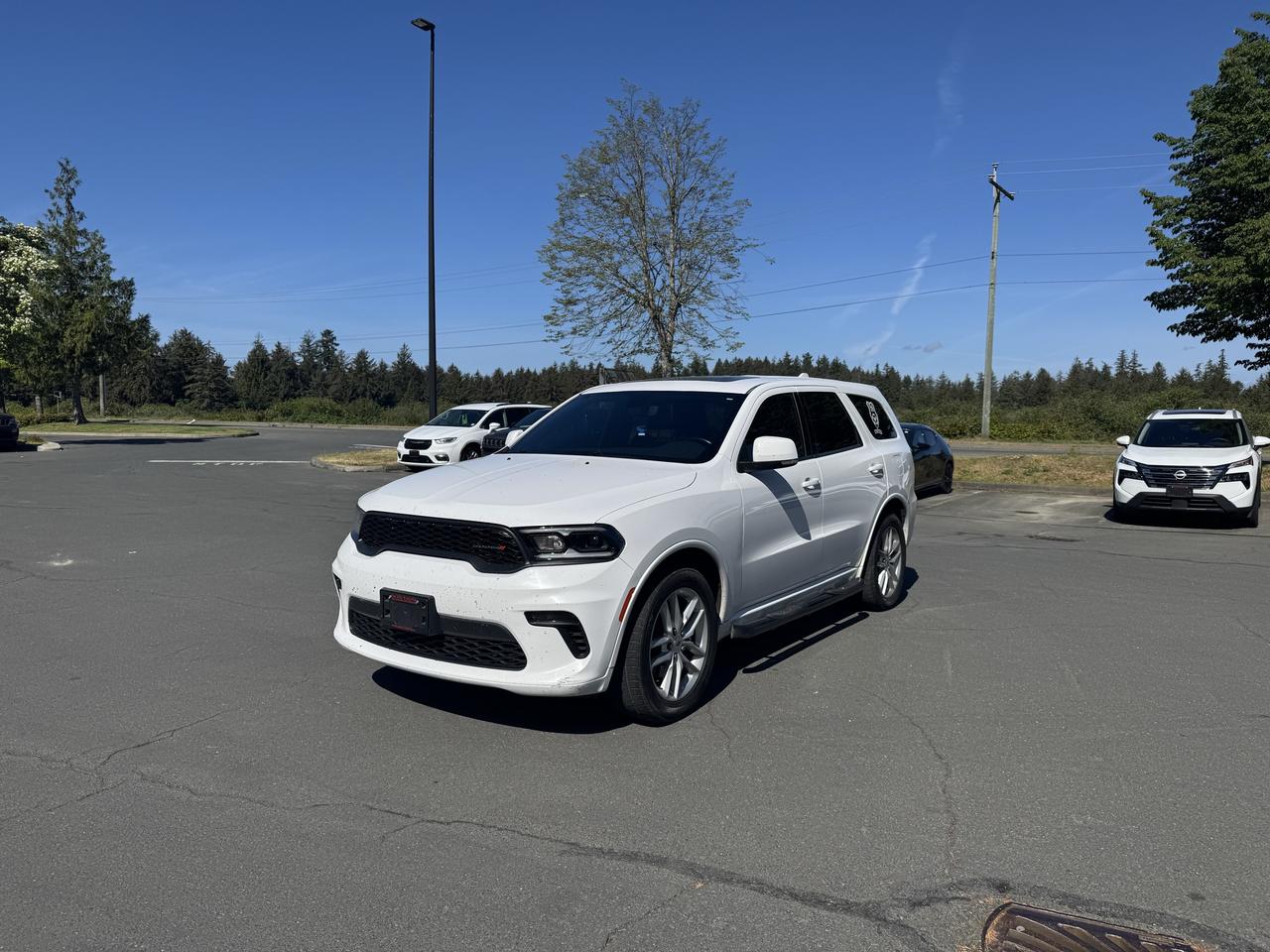 <p>Introducing the rugged yet refined 2021 Dodge Durango GT, ready for your next adventure. This all-wheel-drive SUV, presented in a classic white exterior with a sleek black interior, offers the perfect blend of versatility and style. Whether youre navigating city streets or venturing off the beaten path, the Durango GT is engineered to deliver a confident and capable driving experience for you and your family.</p><p>With a robust gasoline engine paired with an automatic transmission, this Durango GT provides smooth power delivery and responsive handling. The spacious interior comfortably accommodates passengers and cargo, making it ideal for everything from daily commutes to weekend getaways. At Pacific Nations Auto Sales and Finance, were proud to offer this well-equipped SUV with 194,500 kilometers on the odometer, a testament to its enduring performance.</p><p>Here are five features that truly make this 2021 Dodge Durango GT stand out:</p><ul><li><strong>All-Wheel Drive Capability:</strong> Conquer any road condition with confidence, from snowy Canadian winters to unpredictable terrain.</li><li><strong>Powerful Gasoline Engine:</strong> Experience exhilarating performance and smooth acceleration for every drive.</li><li><strong>Spacious SUV/Crossover Body Style:</strong> Enjoy ample room for passengers and all your gear, making it perfect for families and active lifestyles.</li><li><strong>Sleek White Exterior & Black Interior:</strong> Present a sophisticated and timeless look that turns heads.</li><li><strong>Automatic Transmission:</strong> Effortlessly navigate traffic and enjoy a relaxed driving experience.</li></ul><p><strong><em>Powered by AutoIntelligence&trade;</em></strong></p><p>Vehicle information has been generated using artificial intelligence and is provided for informational purposes only. While efforts are made to ensure accuracy, please confirm all details directly with the dealer.</p><p><strong>At Pacific Nations, we believe buying a vehicle should be straightforward, transparent, and stress-free. Here&rsquo;s what sets us apart:</strong></p><p>&bull; <strong>Thoroughly Inspected & Reconditioned Vehicles</strong><br>Every vehicle goes through a detailed safety and mechanical inspection before being offered for sale. We focus on quality and reliability, not just price.</p><p>&bull; <strong data-start=47 data-end=77>Free Carfax History Report</strong><br data-start=77 data-end=80>Every vehicle includes a full <strong data-start=110 data-end=203>Carfax history report available directly on our website &mdash; no contact information required</strong>, so you can review the vehicle&rsquo;s history upfront. No surprises.</p><p>&bull; <strong>Flexible Financing for All Credit Types</strong><br>Good credit, bad credit, or no credit? We work with over 15 trusted lenders to secure the best approval, rate, and terms for your situation.</p><p>&bull; <strong>Finance-First, Payment-Focused Approach</strong><br>We structure deals around affordable payments that make sense long-term, not high-pressure sales tactics.</p><p>&bull; <strong>Over 1,000 Five-Star Google Reviews</strong><br>Our reputation is built on honesty, transparency, and long-term relationships with our customers across Vancouver Island.</p><p>&bull; <strong>Large Inventory + Access to Thousands More</strong><br>We carry 40&ndash;65 fully inspected vehicles in stock and have access to thousands more if you&rsquo;re looking for something specific.</p><p>&bull; <strong>Part of the Steve Marshall Auto Group</strong><br>As part of a dealer group with <strong>16 locations</strong>, we can source inventory across the network to help find the exact vehicle you&rsquo;re looking for.</p><p>&bull; <strong>BC Wide Delivery Available</strong><br>Can&rsquo;t make it to us? We can deliver your vehicle to your door anywhere in BC.</p><p>&bull; <strong>Transparent Fee Disclosure</strong><br>All vehicle prices are plus a <strong>$699 documentation fee</strong> and a <strong>$499 vehicle preparation fee</strong>. These fees cover the administrative processing, vehicle inspection, detailing, and preparation required to ensure your vehicle is fully ready and compliant before delivery.</p>