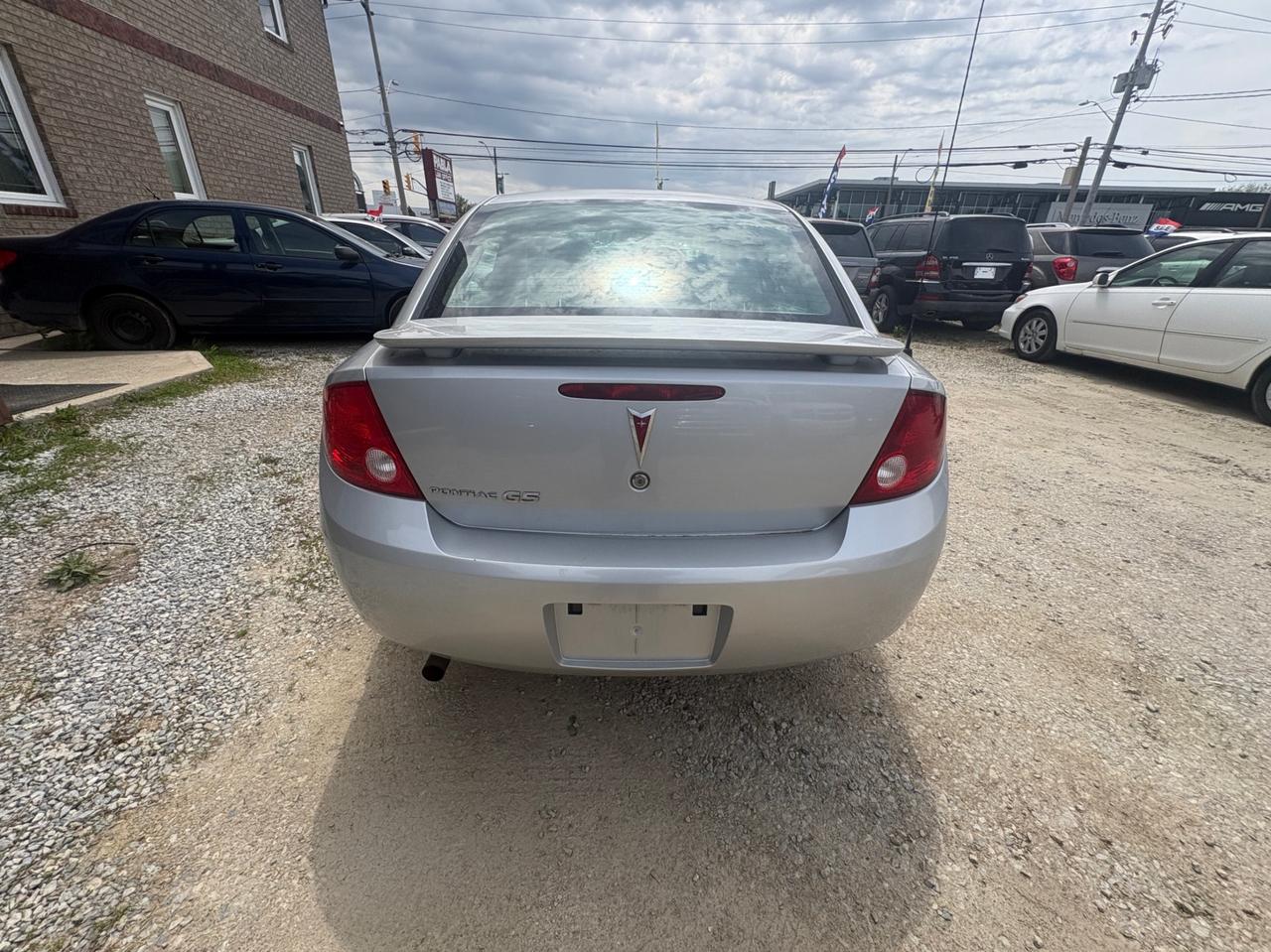 2007 Pontiac G5 SE - ONE OWNER • CLEAN CARFAX, Safety Included and 1-Year Powertrain Warranty Photo