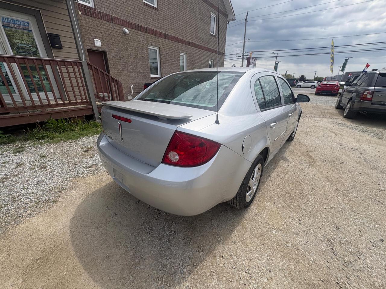 2007 Pontiac G5 SE - ONE OWNER • CLEAN CARFAX, Safety Included and 1-Year Powertrain Warranty Photo