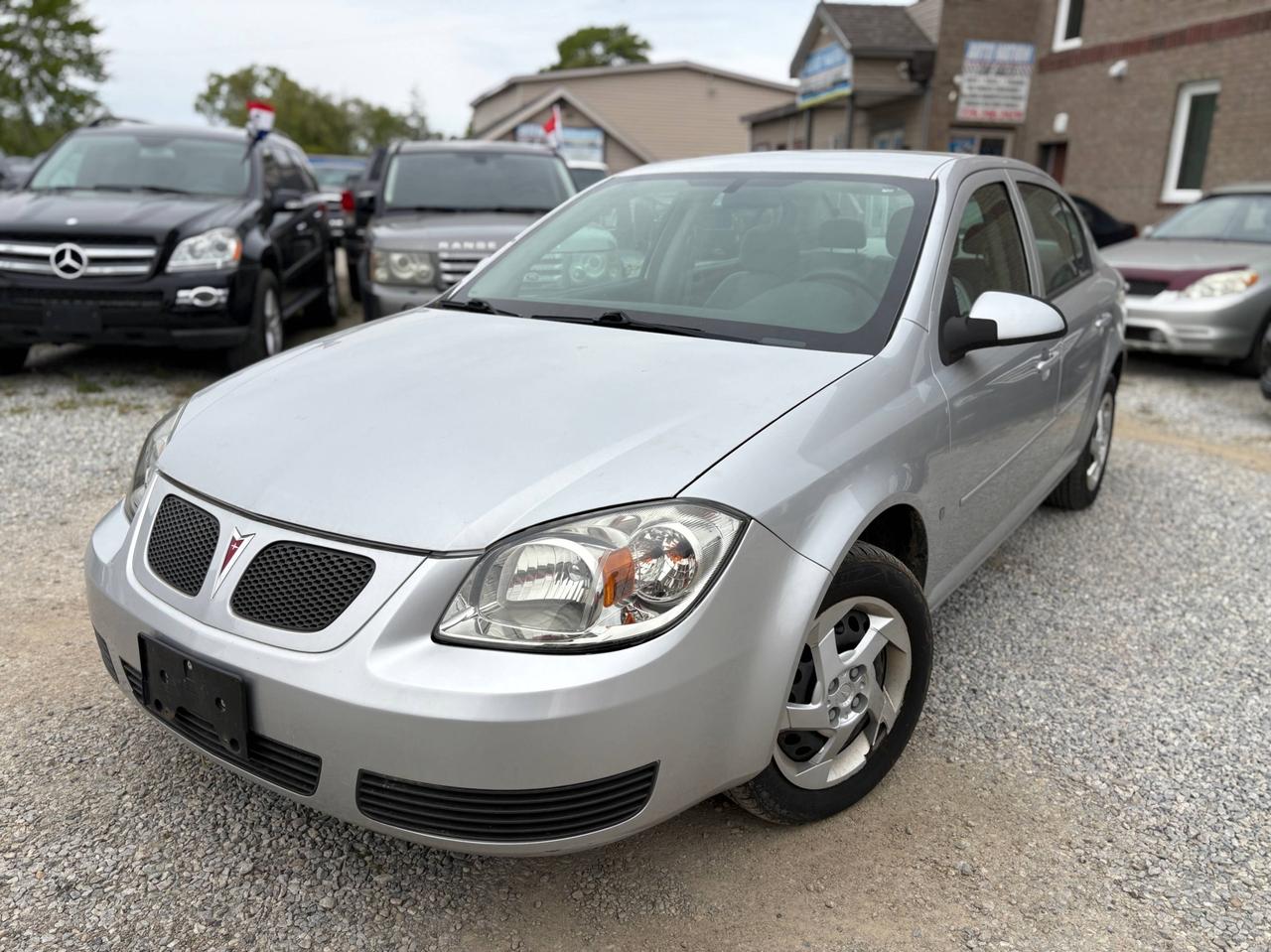 Used 2007 Pontiac G5 SE - ONE OWNER • CLEAN CARFAX, Safety Included and 1-Year Powertrain Warranty for sale in Windsor, ON