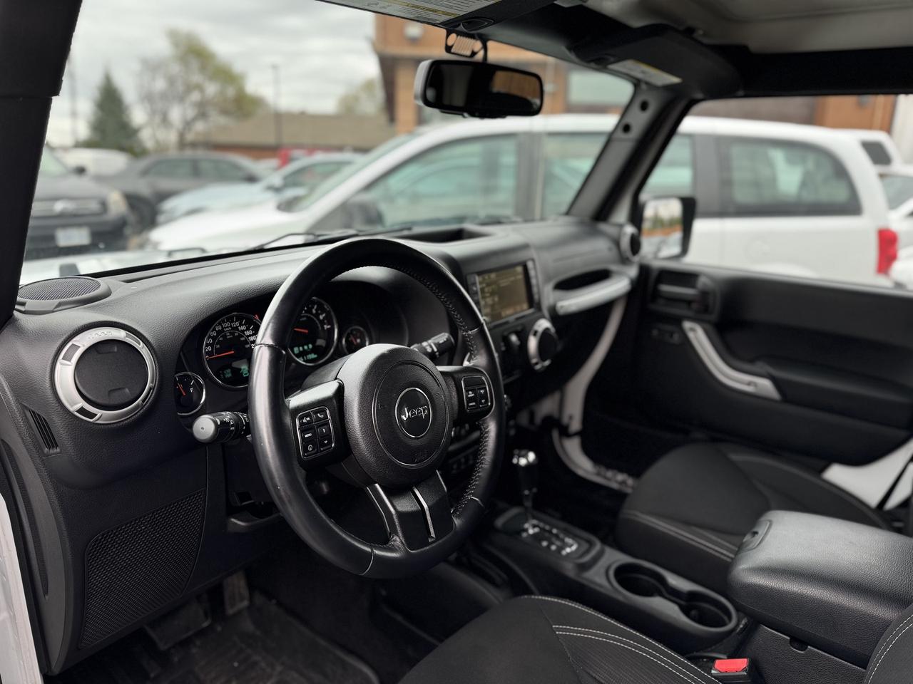 2016 Jeep Wrangler 4WD Sahara Photo