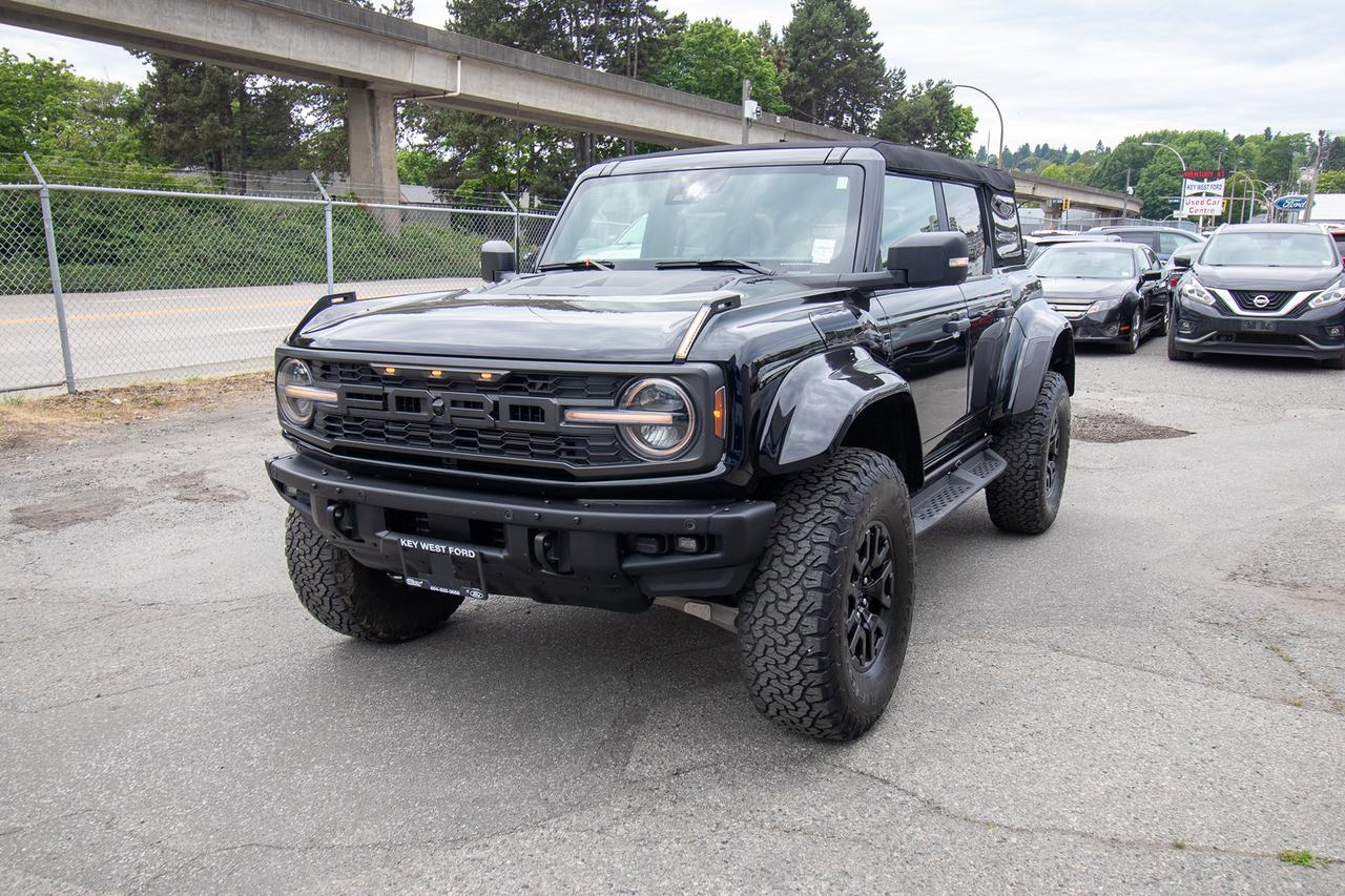 <p>Get ready to conquer any terrain with this incredible, pre-loved 2024 Ford Bronco Raptor 4 Door 4x4, waiting for you at Key West Ford. Dressed in a sleek, commanding black exterior, this Bronco Raptor is more than just a vehicle; its a statement. Its robust SUV/Crossover body style is built for adventure, and the sophisticated automatic transmission paired with a powerful gasoline engine ensures a smooth yet exhilarating ride. With four doors, theres ample space for your crew and all their gear, making it the ultimate companion for both daily commutes and epic off-road excursions.</p><p>This isnt just any Bronco; its the formidable Raptor trim, engineered for unparalleled performance and capability. The 4-wheel drive system provides unwavering confidence on even the most challenging surfaces, while the legendary Bronco DNA is evident in every sculpted line and rugged detail. Whether youre navigating city streets or forging new paths, this 2024 Ford Bronco Raptor is designed to impress and perform, offering a driving experience thats both thrilling and refined.</p><p>Here are five standout features that make this Bronco Raptor irresistible:</p><ul><li><strong>Legendary Bronco Raptor Performance:</strong> Experience the pinnacle of off-road capability, designed to tackle extreme conditions with its specialized tuning and robust suspension.</li><li><strong>Iconic 4-Door Versatility:</strong> Enjoy the practicality and spaciousness of a four-door SUV, perfect for hauling passengers and cargo without compromising on its adventurous spirit.</li><li><strong>Commanding Black Exterior:</strong> Turn heads with the striking, deep black finish that exudes power and sophistication, making a bold statement wherever you go.</li><li><strong>Advanced 4x4 System:</strong> Confidently take on any challenge with the intelligent 4-wheel drive system, engineered to provide superior traction and control on any surface.</li><li><strong>Rugged Yet Refined Interior:</strong> Step into a cabin that blends durability with comfort, featuring premium materials and advanced technology designed for both adventure and everyday driving.</li></ul><p><strong><em>Powered by AutoIntelligence&trade;</em></strong></p><p>Vehicle information has been generated using artificial intelligence and is provided for informational purposes only. While efforts are made to ensure accuracy, please confirm all details directly with the dealer.</p><p>&nbsp;</p><p>Experience peace of mind with our Buy With Confidence program! This vehicle comes with a comprehensive mechanical and safety inspection, Carfax report, and full disclosure. We are committed to transparent pricing. The advertised price excludes fees: $699 Documentation, $349 Registration/Insurance Transfer, $695 Finance Administration Fee (if applicable), and taxes. As BCs #1 Volume Dealer and #1 for Customer Experience on DealerRater, we prioritize your satisfaction. See Key West Ford for complete details. Book your test drive today!&nbsp; Dealer #7485</p>