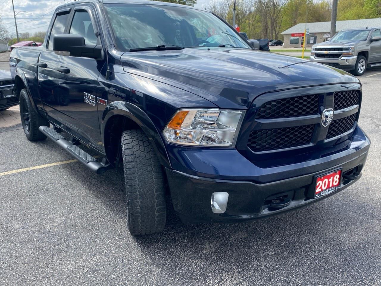 2018 RAM 1500 Outdoorsman 4x4 Quad Cab 6'4 Box Photo