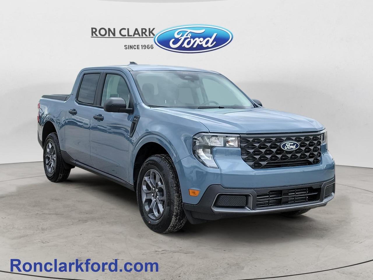 Experience the perfect blend of capability, comfort, and modern technology with this 2026 Ford Maverick XLT in stunning Azure Grey Metallic Tri-Coat. Paired with the refined Navy Pier/Aspen Grey interior, this Maverick delivers style inside and out.Powered by the responsive 2.0L EcoBoost engine, this Maverick offers impressive performance and confidence for everyday driving or weekend adventures. Equipped with the desirable 302A Equipment Group and the 4K Tow Package, it’s ready to handle work, play, and everything in between with enhanced towing capability and added convenience features.Safety and driver confidence come standard with Ford Co-Pilot360, featuring advanced driver-assist technologies designed to keep you connected and protected on the road. Rear Parking Sensors make maneuvering and parking easier than ever, especially in tight spaces.Whether you’re looking for versatility, efficiency, or modern truck capability, this 2026 Maverick XLT checks all the boxes with standout styling, smart technology, and proven EcoBoost power.Come to the dealer you can trust. 58 years and counting Ron Clark Ford & Jayco RV is known for great value and being best in customer service! We serve and deliver all over Ontario including destinations such as Wyoming, Petrolia, Sarnia, London, Guelph, Kitchener-Waterloo, Hamilton, GTA, Ottawa & Chatham-Kent. Call or visit us at RON CLARK FORD & JAYCO RV to view and test drive today! RON CLARK FORD where else!!
