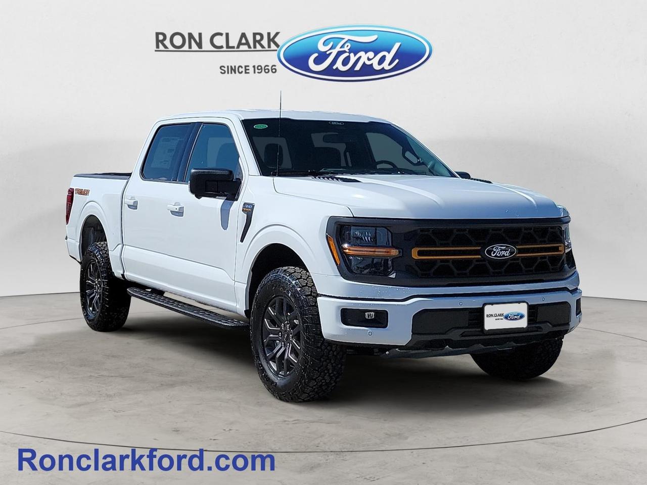 Command attention with this 2026 Ford F-150 Tremor finished in Oxford White with a Black Sport Cloth interior. Built for drivers who demand both off-road confidence and everyday comfort, this Tremor is powered by the legendary 5.0L V8 engine paired with a smooth-shifting 10-speed automatic transmission for impressive performance on and off the pavement.Equipped with the sought-after 401A Equipment Group, this F-150 Tremor delivers premium features, advanced technology, and enhanced comfort throughout the cabin. Skid plates provide added protection for rugged adventures, while the 2kW Pro Power Onboard system turns your truck into a mobile power source for work sites, tailgates, or camping trips.The Bed Utility Package adds extra functionality with integrated cargo solutions and a convenient tailgate step, making loading and accessing the bed easier than ever.With aggressive Tremor styling, proven V8 power, and versatile capability, this 2026 Ford F-150 Tremor SuperCrew is ready for whatever comes next.Come to the dealer you can trust. 58 years and counting Ron Clark Ford & Jayco RV is known for great value and being best in customer service! We serve and deliver all over Ontario including destinations such as Wyoming, Petrolia, Sarnia, London, Guelph, Kitchener-Waterloo, Hamilton, GTA, Ottawa & Chatham-Kent. Call or visit us at RON CLARK FORD & JAYCO RV to view and test drive today! RON CLARK FORD where else!!