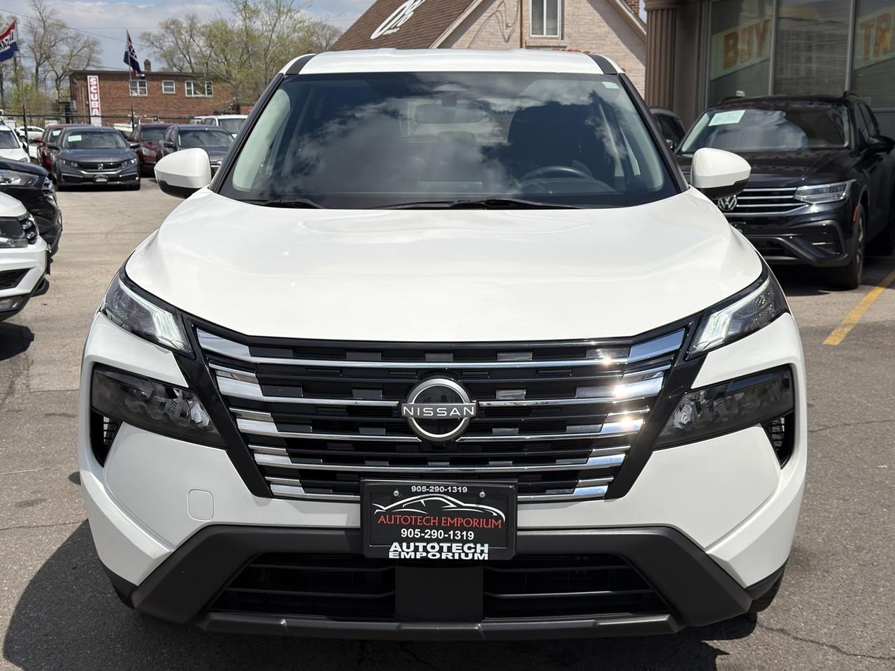 2024 Nissan Rogue S AWD Pearl White   Htd Seats   Htd Steering   Dua Photo