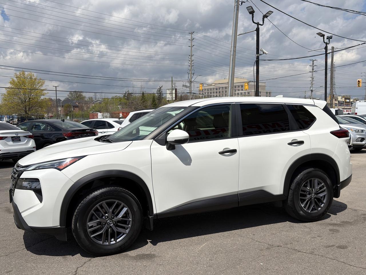 2024 Nissan Rogue S AWD Pearl White   Htd Seats   Htd Steering   Dua Photo