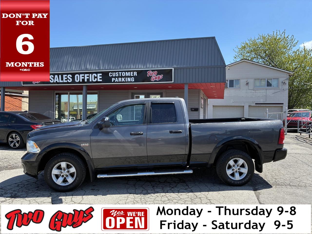 2016 RAM 1500 4WD Quad Cab 140.5 SLT Outdoorsman Back Up Cam Photo
