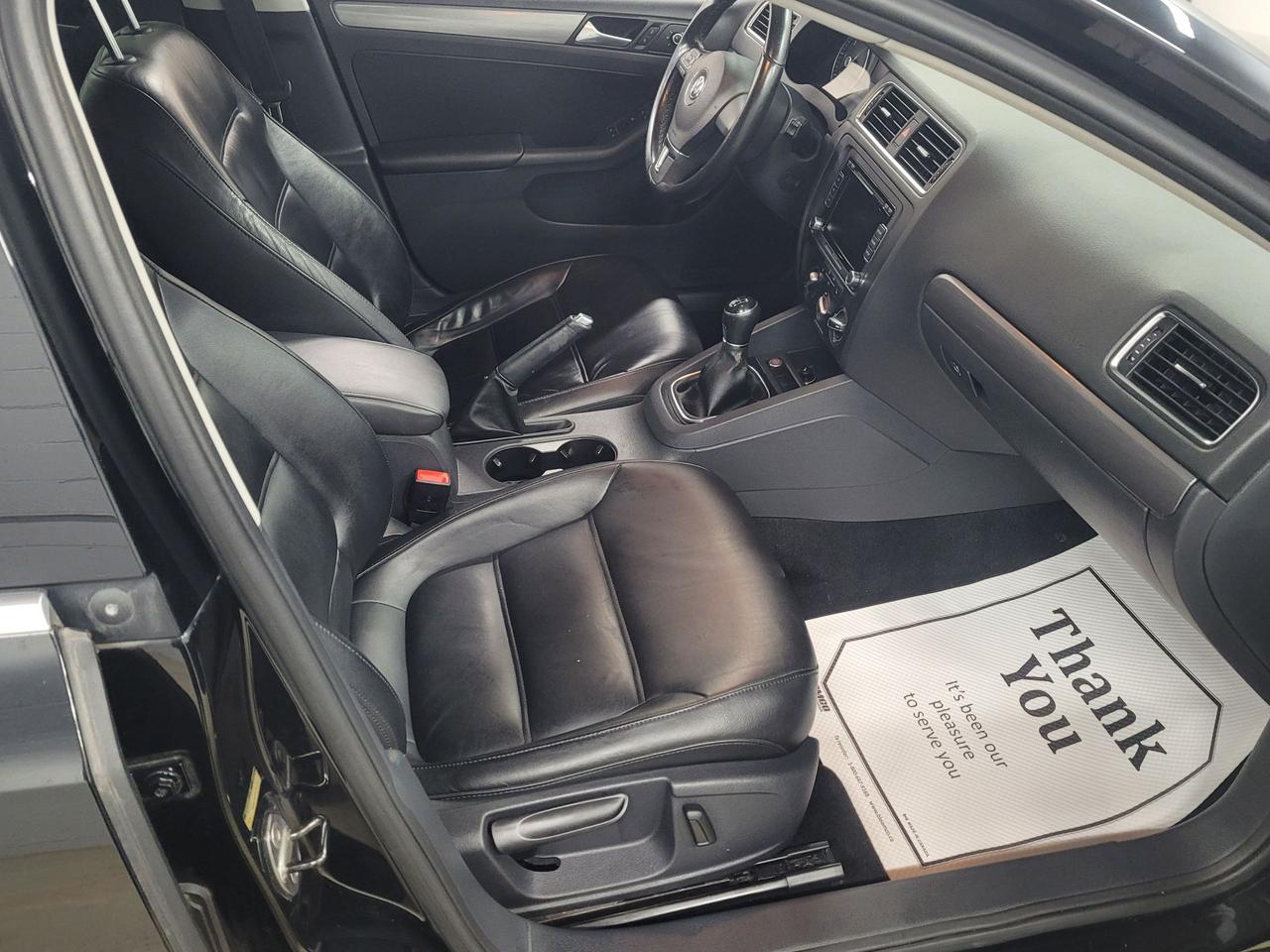 2014 Volkswagen Jetta 4dr 2.0 TDI Man Highline Photo