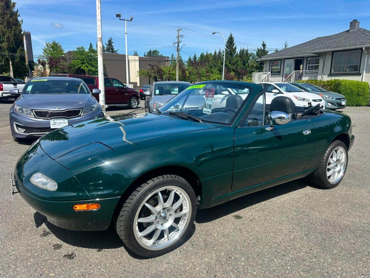 <p> 1996 Mazda Miata Convertible </p><p>ONLY 125,791 KM! <br>5-Speed Manual | Leather Interior | Aftermarket Wheels</p><p>Very clean inside and out, drives amazing, and tons of fun with the top down <br>Low mileage, well kept, and ready for summer cruising!</p><p> 2 Passenger Convertible<br> Leather Seats<br> Manual Transmission<br> Aftermarket Wheels<br> Very Clean Condition<br> Runs & Drives Great</p><p>Hard to find in this condition! Message for more info or to come see it </p><span id=jodit-selection_marker_1778539899859_340811581306128 data-jodit-selection_marker=start style=line-height: 0; display: none;></span> <p><br></p><p>Excellent, Affordable Lubrico Warranty Options Available on ALL Vehicles!</p><p><span style=background-color: rgba(var(--bs-white-rgb),var(--bs-bg-opacity)); color: var(--bs-body-color); font-family: open-sans, -apple-system, BlinkMacSystemFont, "Segoe UI", Roboto, Oxygen, Ubuntu, Cantarell, "Fira Sans", "Droid Sans", "Helvetica Neue", sans-serif; font-size: var(--bs-body-font-size); font-weight: var(--bs-body-font-weight); text-align: var(--bs-body-text-align);>All Vehicles are Safety Inspected by a 3rd Party Inspection Service.&nbsp;</span><br><br>We speak English, French, German, Punjabi, Hindi and Urdu Language!&nbsp;</p><p><br>We are proud to have sold over 15,000 vehicles to our customers throughout B.C. from this same&nbsp;location in Surrey.<span id=jodit-selection_marker_1747949601815_3502933354387793 data-jodit-selection_marker=start style=line-height: 0; display: none;></span></p><p><br>What Makes Us Different? <br>All of our vehicles have been sent to us from new car dealerships. They are all trade-ins and we are a large remarketing centre for the lower mainland new car dealerships. We do not purchase vehicles at auctions or from private sales. <br> <br>Administration Fee of $450<br> <br>Disclaimer: <br>Vehicle options are inputted from a VIN decoder. As we make our best effort to ensure all details are accurate we can not guarantee the information that is decoded from the VIN. Please verify any options before purchasing the vehicle. <br> <br>B.C. Dealers Trade-In Centre <br>14458 104th Ave. <br>Surrey, BC <br>V3R1L9 <br>DL# 26220</p><p> <br> </p><p>6-0-4-5-8-5-1-8-3-1</p>