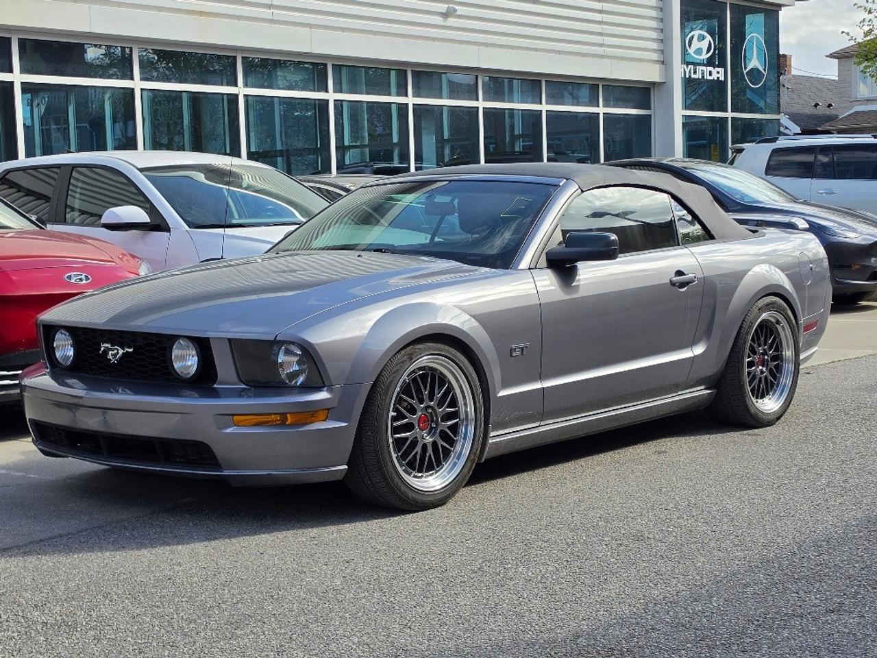 <p><span>Summer nights, top down, clutch in, V8 rumbling through the gears. This 2006 Ford Mustang GT Premium Convertible is everything a proper muscle car should be. Finished in sleek Sky Grey over ceramic leather interior, it brings together old-school American attitude with just the right amount of modern style.</span></p><p><span><br></span></p><p><span>Under the hood sits the legendary 4.6L V8 paired to the only transmission that belongs in a Mustang like this&nbsp; a 5 speed manual. Crack open the throttle and it delivers that unmistakable Mustang soundtrack that turns every tunnel, backroad and lakeside cruise into an event.</span></p><p><span><br></span></p><p><span>The Premium package keeps things comfortable while the sleek BBS style mesh wheels give this pony car an aggressive stance that looks just as good parked at the beach as it does rolling through downtown on a warm summer evening.</span></p><p><span><br></span></p><p><span>Top down, V8 up, radio on. This isnt just transportation, its the reason to take the long way home. Hard to beat the feeling of a classic Mustang GT convertible rowing through the gears with the summer air pouring in.</span></p><p><span><span id=jodit-selection_marker_1778533451971_29595949103368424 style=line-height: 0; display: none; data-jodit-selection_marker=start></span><br></span></p><p><span>{ CERTIFIED PRE-OWNED }<br><br>**THIS VEHICLE COMES FULLY CERTIFIED WITH A SAFETY CERTIFICATE & SERVICED AT NO EXTRA COST**<br></span></p><p><span><br></span></p><p><span>FINANCING, GAP INSURANCE & EXTENDED WARRANTIES AVAILABLE ON ALL VEHICLES! <br><br>COLISEUM AUTO SALES ON WESTON <br>301 WESTON ROAD <br>TORONTO, ON M6N 3P1 <br>4 1 6 - 7 6 6 - 2 2 7 7<br></span></p>