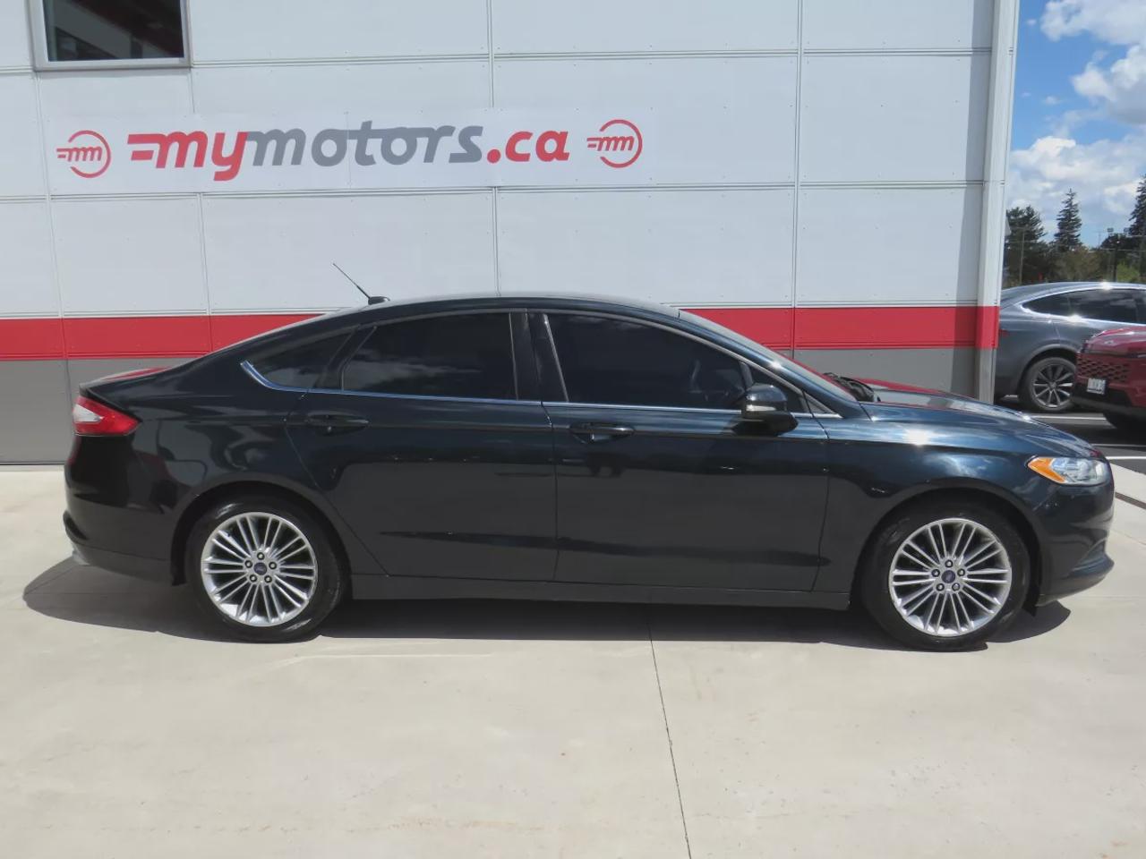 2014 Ford Fusion SE | Clean Title No Accidents | Alloy Rims | Tints | Digital Touchscreen | Reverse Camera | CD Player | Photo