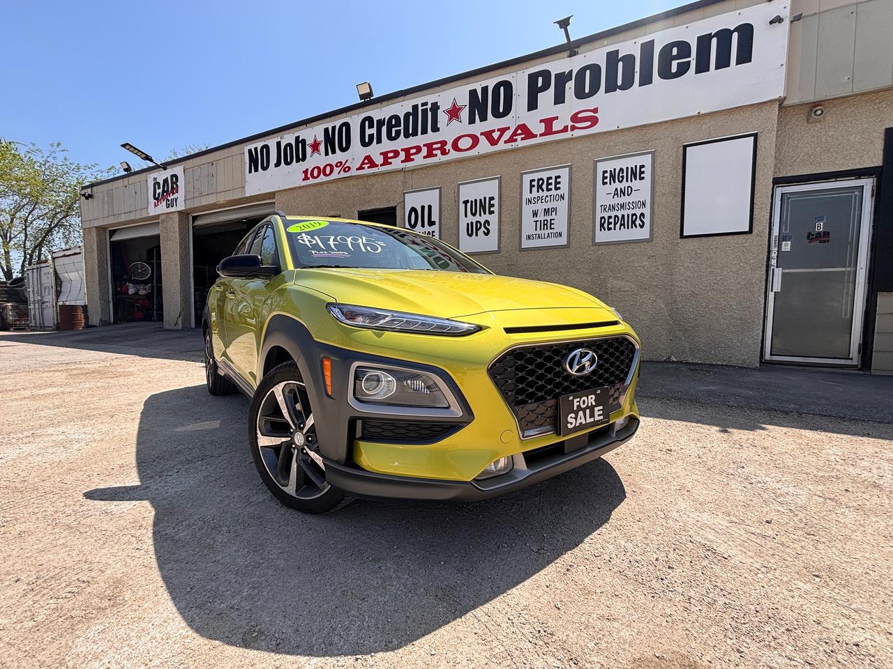 <p>🚙🔥 <strong>2019 Hyundai Kona 1.6T Ultimate AWD &ndash; Turbocharged Performance | Ultimate Luxury | Stand Out in Lime!</strong> 🔥🚙</p><p>✔️ Ultimate Trim | ✔️ Turbocharged | ✔️ AWD | ✔️ Fully Loaded</p><p>📦 <strong>Stock #:</strong> KU324469<br>🔎 <strong>VIN #:</strong> KM8K5CA58KU324469<br>🏷️ <strong>Dealer#4660</strong></p><p>💰 <strong>Financing Available &ndash; ALL Credit Types Welcome!</strong><br>🔄 <strong>Trade-Ins Welcome!</strong></p><p>Looking for a compact SUV thats anything but ordinary? This <strong>2019 Hyundai Kona 1.6T Ultimate AWD</strong> combines sporty turbocharged performance, premium luxury features, and eye-catching <strong>Lime Colour Package</strong> styling. Its the perfect SUV for commuting, road trips, and tackling Manitoba weather with confidence.</p><p>Powered by a responsive <strong>1.6L Turbocharged 4-Cylinder engine</strong> and Hyundais intelligent <strong>AWD system</strong>, this Kona delivers exciting performance, excellent fuel economy, and all-season capability.</p><p>━━━━━━━━━━━━━━━━━━</p><p>⚙️ <strong>Vehicle Information</strong></p><p>&bull; 1.6L Turbocharged 4-Cylinder Engine<br>&bull; Automatic Transmission<br>&bull; All-Wheel Drive (AWD)<br>&bull; Ultimate Trim Package<br>&bull; Lime Colour Package<br>&bull; Premium Compact SUV</p><p>━━━━━━━━━━━━━━━━━━</p><p>✨ <strong>Luxury & Comfort Features</strong></p><p>✔️ Leather Seating Surfaces<br>✔️ Heated Front Seats<br>✔️ Heated Steering Wheel<br>✔️ Power Sunroof<br>✔️ Dual-Zone Automatic Climate Control<br>✔️ Premium Interior Finish</p><p>━━━━━━━━━━━━━━━━━━</p><p>📱 <strong>Technology Features</strong></p><p>✔️ Touchscreen Infotainment System<br>✔️ Navigation System<br>✔️ Apple CarPlay & Android Auto<br>✔️ Bluetooth Connectivity<br>✔️ Backup Camera<br>✔️ Push-Button Start</p><p>━━━━━━━━━━━━━━━━━━</p><p>🛡️ <strong>Safety & Driver Assistance</strong></p><p>✔️ Blind Spot Monitoring<br>✔️ Lane Keeping Assist<br>✔️ Forward Collision Warning<br>✔️ Rear Cross-Traffic Alert<br>✔️ Stability & Traction Control<br>✔️ AWD Confidence for Every Season</p><p>━━━━━━━━━━━━━━━━━━</p><p>💎 <strong>Why Youll Love This Kona Ultimate</strong></p><p>🔥 Turbocharged performance thats fun to drive<br>🍋 Unique Lime Colour Package that turns heads everywhere<br>❄️ AWD confidence for Manitoba winters<br>⛽ Excellent fuel economy without sacrificing power<br>✨ Fully loaded Ultimate trim with premium comfort and technology</p><p>━━━━━━━━━━━━━━━━━━</p><p>📍 <strong>THE CAR GUY INC.</strong><br>2850 Dugald Road, Winnipeg, MB R2C 3Z5</p><p>📞 <strong>Office:</strong> 204-255-1297<br>☎️ <strong>Toll Free:</strong> 1-866-439-2295<br>📱 <strong>Call or Text Sales:</strong> 204-881-5932</p><p>🌐 <strong>Website:</strong> <a href=https://carguyinc.ca/>https://carguyinc.ca</a><br>📘 <strong>Facebook:</strong> The Car Guy Inc.<br>📸 <strong>Instagram:</strong> @thecarguyinc<br>🎵 <strong>TikTok:</strong> @thecarguyinc</p><p>🕒 <strong>Hours of Operation</strong><br>Monday&ndash;Friday: <strong>10:00 AM &ndash; 6:00 PM</strong><br>Saturday: <strong>10:00 AM &ndash; 5:00 PM</strong><br>Sunday: <strong>Closed</strong></p><p>🚨 <strong>Dont miss out on this fully loaded Kona Ultimate!</strong> Stylish, sporty, fuel-efficient, and packed with premium features&mdash;visit The Car Guy Inc., message us online, or book your test drive today before its gone!</p><p>⚠️ <strong>IMPORTANT FEATURE DISCLAIMER</strong><br>Please note: The features listed above are auto-generated using the vehicles VIN. While we strive for accuracy, actual features may vary by vehicle. Please confirm all details with the dealership, as the listed features are not guaranteed.</p>