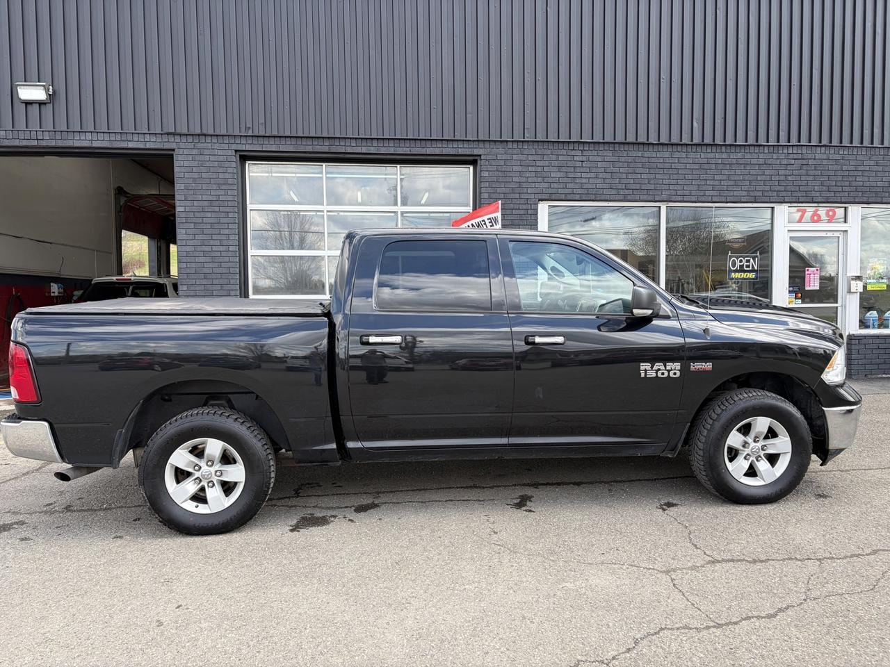 <p>Looking for a reliable and capable truck that can handle your work and your weekend adventures? SMB Auto Sales has the perfect solution with this rugged 2017 RAM 1500 SLT Crew Cab. This 4x4 pickup is built to perform, offering the versatility and power you need for any task. With its spacious Crew Cab, youll have plenty of room for passengers and gear, making it ideal for families or crews.</p>
<p>This 2017 RAM 1500 SLT is equipped with a suite of features designed for your comfort and convenience. Whether youre tackling tough jobs or cruising down the highway, youll appreciate the smooth automatic transmission and the confidence of 4-wheel drive. This truck has seen its share of adventures, with 210,204 kilometers on the odometer, proving its durability and readiness for many more miles to come.</p>
<p>Here are five features that make this RAM 1500 SLT stand out:</p>
<ul>
<li><strong>4-Wheel Drive Capability:</strong> Conquer any terrain or weather condition with confidence, from snowy Canadian winters to off-road trails.</li>
<li><strong>Crew Cab Comfort:</strong> Enjoy ample space for up to five passengers, ensuring everyone travels in comfort, whether its a short commute or a long road trip.</li>
<li><strong>Remote/Keyless Entry:</strong> Get in and out of your truck with ease, especially when your hands are full.</li>
<li><strong>Steering Wheel Controls:</strong> Keep your eyes on the road and your hands on the wheel while managing your audio and cruise control settings.</li>
<li><strong>Traction Control & Vehicle Stability Management:</strong> These advanced systems work together to enhance your control and safety, providing peace of mind in challenging driving situations.</li>
</ul>
<p><strong><em>Powered by AutoIntelligence™</em></strong></p>
<p>Vehicle information has been generated using artificial intelligence and is provided for informational purposes only. While efforts are made to ensure accuracy, please confirm all details directly with the dealer.</p>
