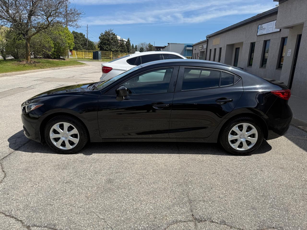 2016 Mazda MAZDA3 BLACK/BLACK,AUTOMATIC,REAR VIEW CAMERA..CERTIFIED! Photo
