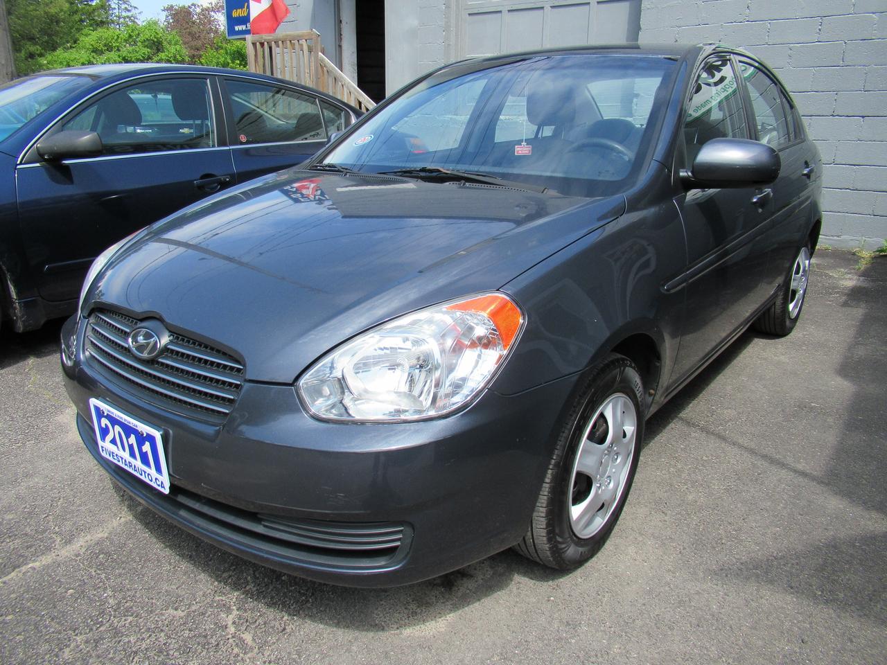 <p>All of our cars come with a 6 month limited warranty that pays the first $1000 of a repair. It covers engine, transmission, seals and gaskets.</p><p>Looking for a reliable and stylish ride that wont break the bank? At Five Star Auto, we have a fantastic <strong>2011 Hyundai Accent GL</strong> thats ready for its next adventure! This eye-catching grey sedan offers a comfortable and practical driving experience, perfect for navigating city streets or embarking on weekend getaways. With its proven track record for dependability and fuel efficiency, this Accent is an excellent choice for anyone seeking a smart and affordable vehicle.</p><p>Step inside this well-maintained Accent GL and youll find a clean grey interior, designed for your comfort. The automatic transmission makes for effortless driving, while the front-wheel drive provides solid handling. This sedan boasts four doors, offering easy access for passengers and ample cargo space for your everyday needs. With just 114,000 kilometers on the odometer, this Hyundai Accent has plenty of life left to offer a new owner.</p><p>Here are five features that truly make this 2011 Hyundai Accent GL shine:</p><ul><li><strong>Automatic Transmission:</strong> Enjoy smooth and stress-free driving, whether youre commuting or cruising.</li><li><strong>Fuel-Efficient Gasoline Engine:</strong> Get more miles for your money and spend less time at the pump.</li><li><strong>Sleek Sedan Body Style:</strong> A classic and versatile design thats both practical and attractive.</li><li><strong>Front-Wheel Drive:</strong> Experience confident handling and stability in various road conditions.</li><li><strong>Four Doors:</strong> Easy entry and exit for all passengers, plus convenient access to the trunk.</li></ul><p><strong><em>Powered by AutoIntelligence&trade;</em></strong></p><p>Vehicle information has been generated using artificial intelligence and is provided for informational purposes only. While efforts are made to ensure accuracy, please confirm all details directly with the dealer.</p>
