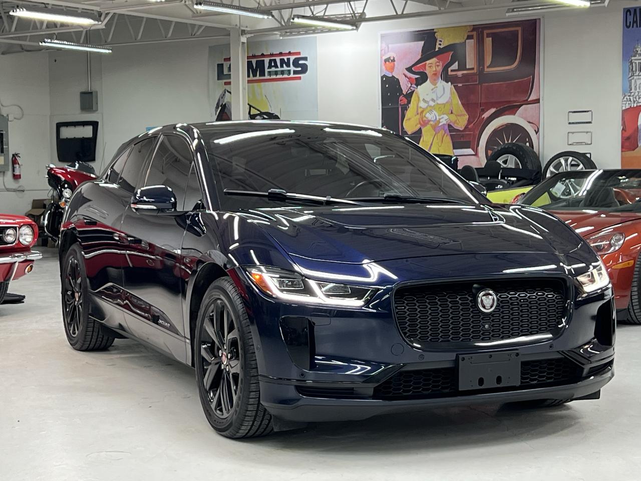 <h2 data-section-id=gtnt1n data-start=0 data-end=51>🔵 2021 Jaguar I-PACE SE AWD | EV400 | 64,000 KM</h2><p data-start=53 data-end=275>Finished in stunning <strong data-start=74 data-end=92>Portofino Blue</strong> over <strong data-start=98 data-end=143>Ebony leather with Light Oyster stitching</strong>, this Jaguar I-PACE SE delivers everything a modern luxury EV should &mdash; performance, comfort, technology, and unmistakable presence. Properly serviced at the Jaguar dealer, on schedule.&nbsp;</p><p data-start=277 data-end=411>Powered by Jaguar&rsquo;s <strong data-start=297 data-end=328>EV400 dual-motor AWD system</strong>, the I-PACE produces:<br>⚡ 394 HP<br data-start=359 data-end=362>⚡ Instant torque<br data-start=378 data-end=381>⚡ All-wheel drive confidence</p><p data-start=413 data-end=449>Smooth, quiet, and incredibly quick.</p><h3 data-section-id=1qebt7v data-start=451 data-end=474>Factory Highlights:</h3><ul data-start=475 data-end=843><li data-section-id=111ip94 data-start=475 data-end=495><strong data-start=477 data-end=495>90 kWh Battery</strong></li><li data-section-id=111ip94 data-start=475 data-end=495><strong data-start=477 data-end=495>Cold Climate Pkg.</strong></li><li data-section-id=tmwjyq data-start=496 data-end=522><strong data-start=498 data-end=522>Panoramic Glass Roof</strong></li><li data-section-id=3zpr8y data-start=523 data-end=544><strong data-start=525 data-end=544>Head-Up Display</strong></li><li data-section-id=1jmqjo4 data-start=545 data-end=573><strong data-start=547 data-end=573>Meridian Premium Audio</strong></li><li data-section-id=1vu5y8w data-start=574 data-end=598><strong data-start=576 data-end=598>Heated Front Seats</strong></li><li data-section-id=99a08n data-start=599 data-end=626><strong data-start=601 data-end=626>Heated Steering Wheel</strong></li><li data-section-id=1tlixra data-start=627 data-end=661><strong data-start=629 data-end=661>Apple CarPlay & Android Auto</strong></li><li data-section-id=16afi5r data-start=662 data-end=682><strong data-start=664 data-end=682>Navigation Pro</strong></li><li data-section-id=19uxar4 data-start=683 data-end=707><strong data-start=685 data-end=707>3D Surround Camera</strong></li><li data-section-id=qpwmdu data-start=708 data-end=731><strong data-start=710 data-end=731>Blind Spot Assist</strong></li><li data-section-id=588607 data-start=732 data-end=752><strong data-start=734 data-end=752>Air Suspension</strong></li><li data-section-id=108mhmc data-start=753 data-end=781><strong data-start=755 data-end=781>20&rdquo; Gloss Black Wheels</strong></li><li data-section-id=1uhetzk data-start=782 data-end=802><strong data-start=784 data-end=802>Power Tailgate</strong></li><li data-section-id=k43mm2 data-start=803 data-end=843><strong data-start=805 data-end=843>ClearSight Digital Rearview Mirror</strong></li></ul><p data-start=845 data-end=944>This is a very sharp, well-optioned Canadian vehicle with an original MSRP approaching six figures.</p><p data-start=946 data-end=1023>At Lee Munro&rsquo;s Garage, we look for vehicles that stand out from the ordinary.</p><h3 data-section-id=16u4yk data-start=1025 data-end=1085>&ldquo;We don&rsquo;t sell cars &mdash; we buy cars that sell themselves.&rdquo;</h3><p data-start=1087 data-end=1117>This Jaguar does exactly that.</p><p data-start=1119 data-end=1190>✔ Fully inspected<br data-start=1136 data-end=1139>✔ 72-hour money-back guarantee<br data-start=1169 data-end=1172>✔ No test drives</p><p data-start=1192 data-end=1250 data-is-last-node= data-is-only-node=>📍 Lee Munro&rsquo;s Garage &ndash; Paris, Ontario<br data-start=1230 data-end=1233>📞 Contact today.</p>