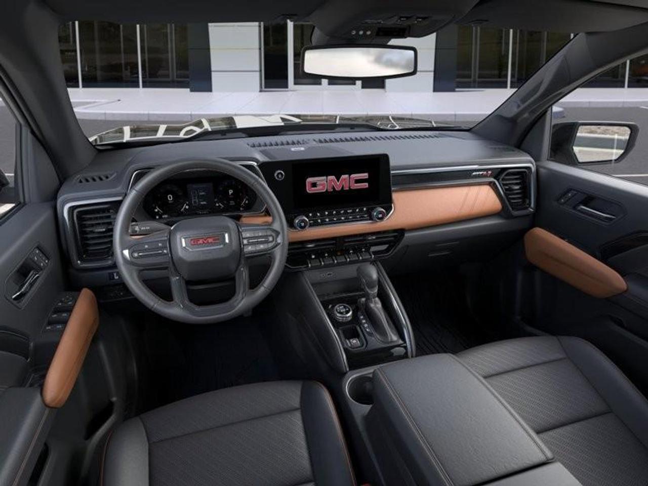 2026 GMC Canyon AT4 New 5 Passenger Mid Size 4X4 Truck with a Power Sunroof, Power Front Seats, Heated and Cooled Front Seats, Heated Steering Wheel, Adaptive Cruise Control, Heads Up Drivers Display, and a 11 Diagonal T Photo