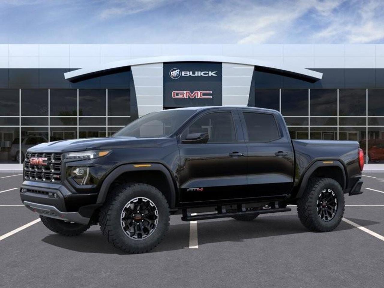 2026 GMC Canyon AT4 New 5 Passenger Mid Size 4X4 Truck with a Power Sunroof, Power Front Seats, Heated and Cooled Front Seats, Heated Steering Wheel, Adaptive Cruise Control, Heads Up Drivers Display, and a 11 Diagonal T Photo