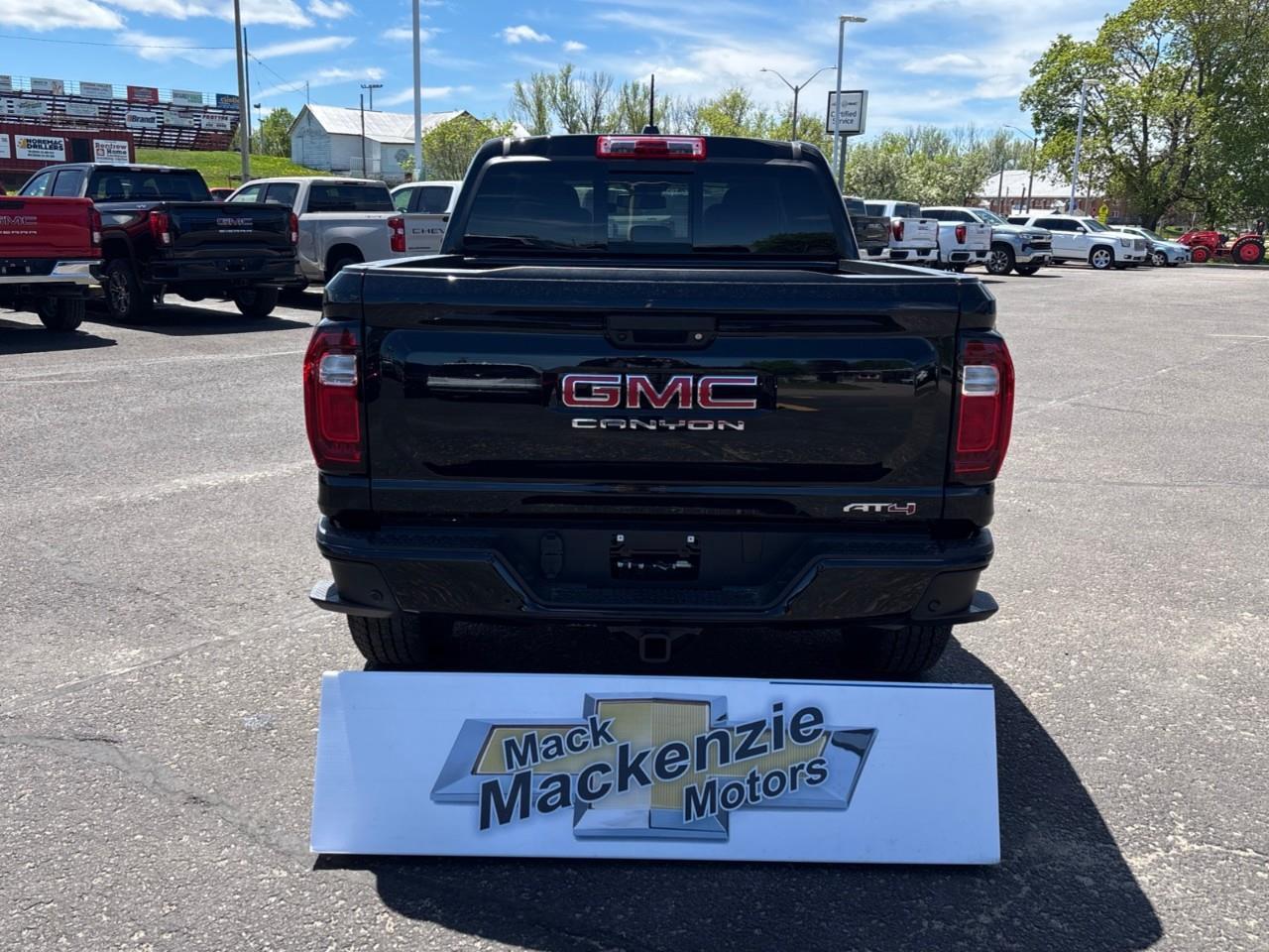 2026 GMC Canyon AT4 New 5 Passenger Mid Size 4X4 Truck with a Power Sunroof, Power Front Seats, Heated and Cooled Front Seats, Heated Steering Wheel, Adaptive Cruise Control, Heads Up Drivers Display, and a 11 Diagonal T Photo
