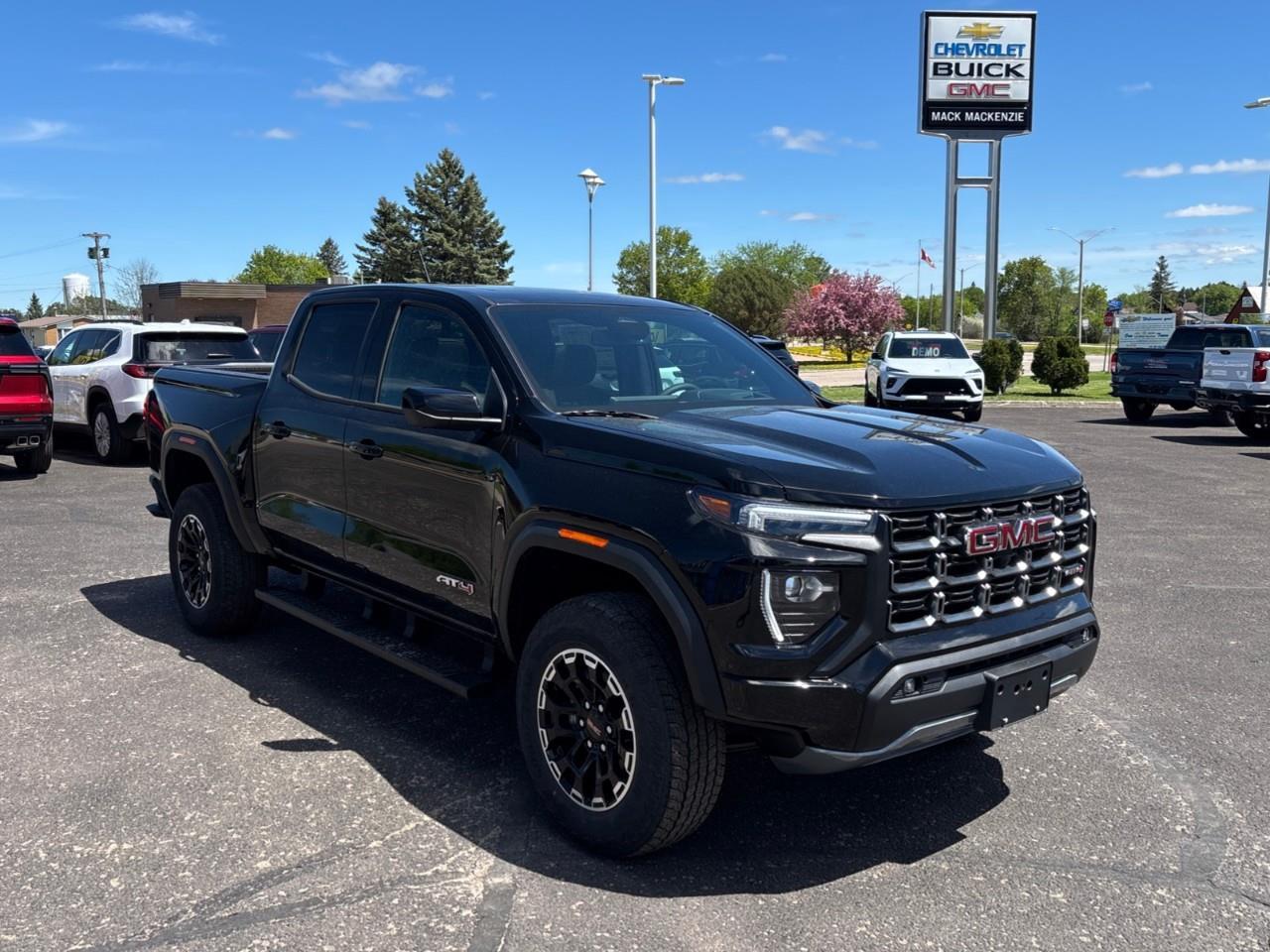 2026 GMC Canyon AT4 New 5 Passenger Mid Size 4X4 Truck with a Power Sunroof, Power Front Seats, Heated and Cooled Front Seats, Heated Steering Wheel, Adaptive Cruise Control, Heads Up Drivers Display, and a 11 Diagonal T Photo