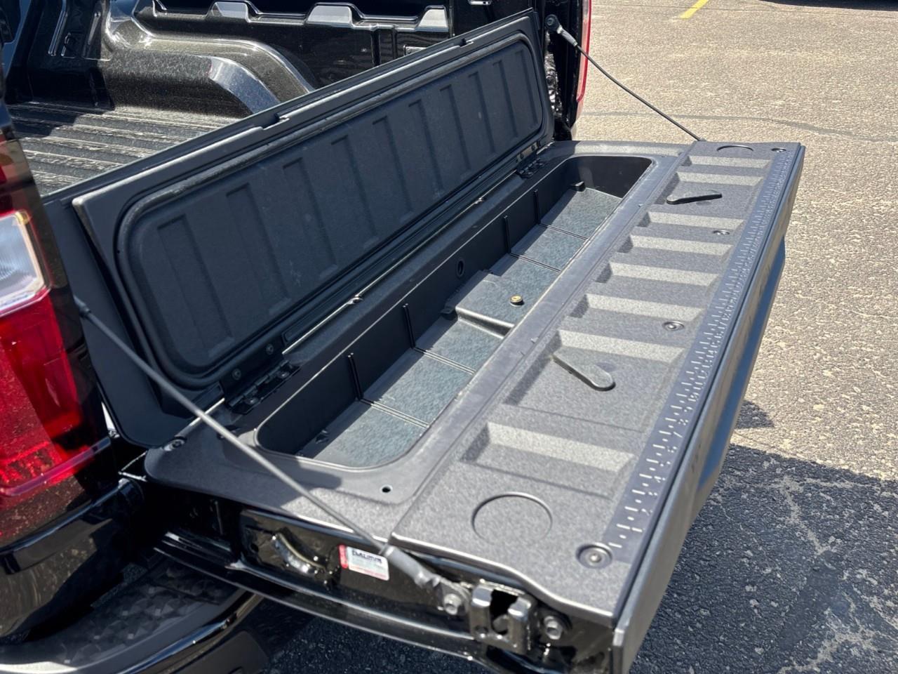 2026 GMC Canyon AT4 New 5 Passenger Mid Size 4X4 Truck with a Power Sunroof, Power Front Seats, Heated and Cooled Front Seats, Heated Steering Wheel, Adaptive Cruise Control, Heads Up Drivers Display, and a 11 Diagonal T Photo