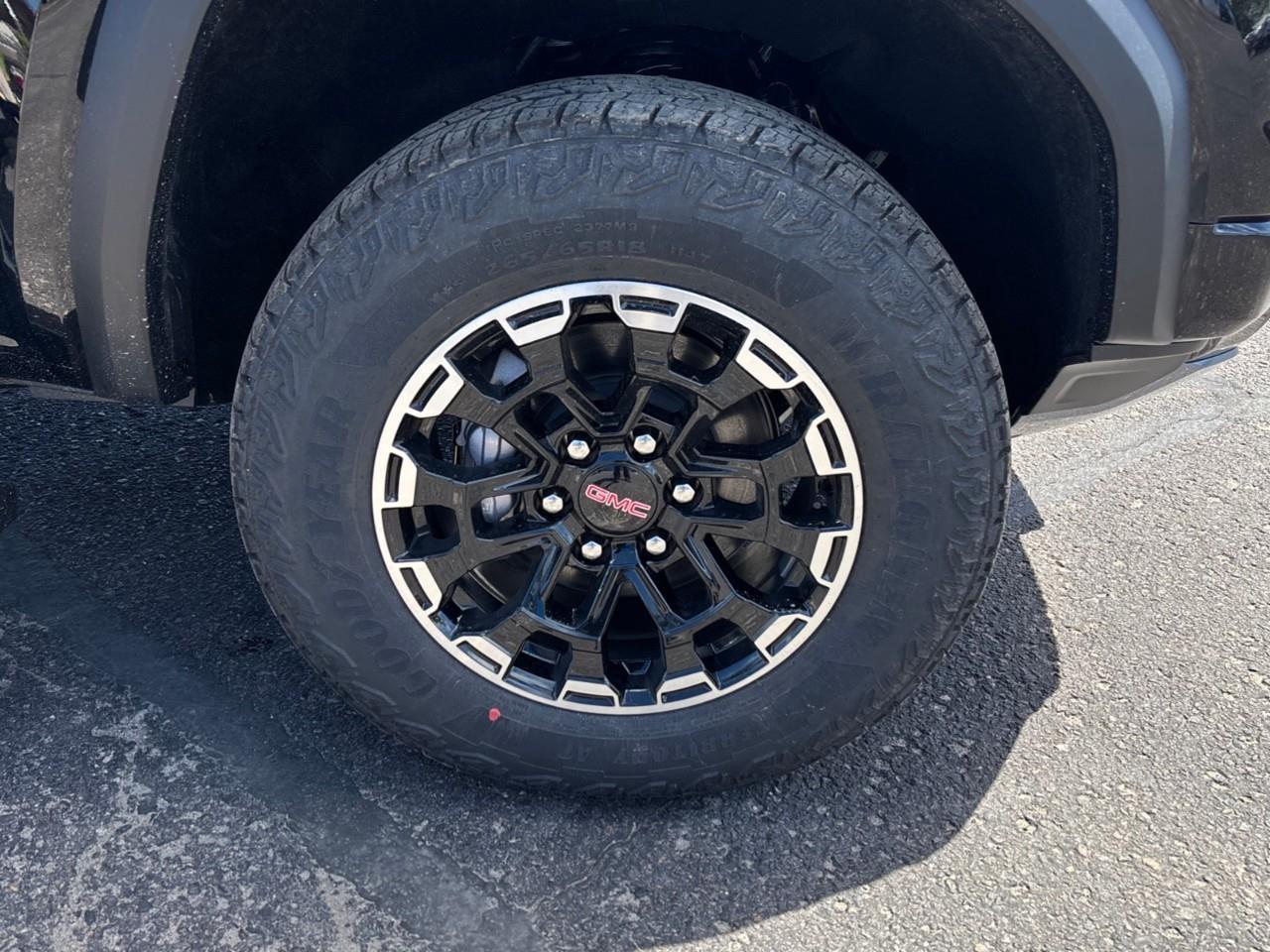 2026 GMC Canyon AT4 New 5 Passenger Mid Size 4X4 Truck with a Power Sunroof, Power Front Seats, Heated and Cooled Front Seats, Heated Steering Wheel, Adaptive Cruise Control, Heads Up Drivers Display, and a 11 Diagonal T Photo