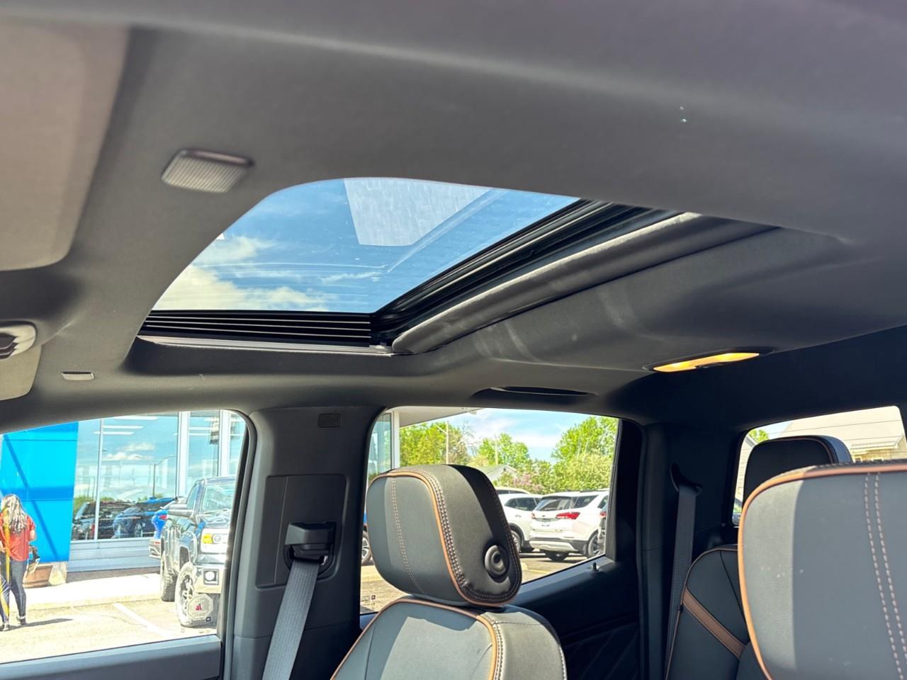 2026 GMC Canyon AT4 New 5 Passenger Mid Size 4X4 Truck with a Power Sunroof, Power Front Seats, Heated and Cooled Front Seats, Heated Steering Wheel, Adaptive Cruise Control, Heads Up Drivers Display, and a 11 Diagonal T Photo