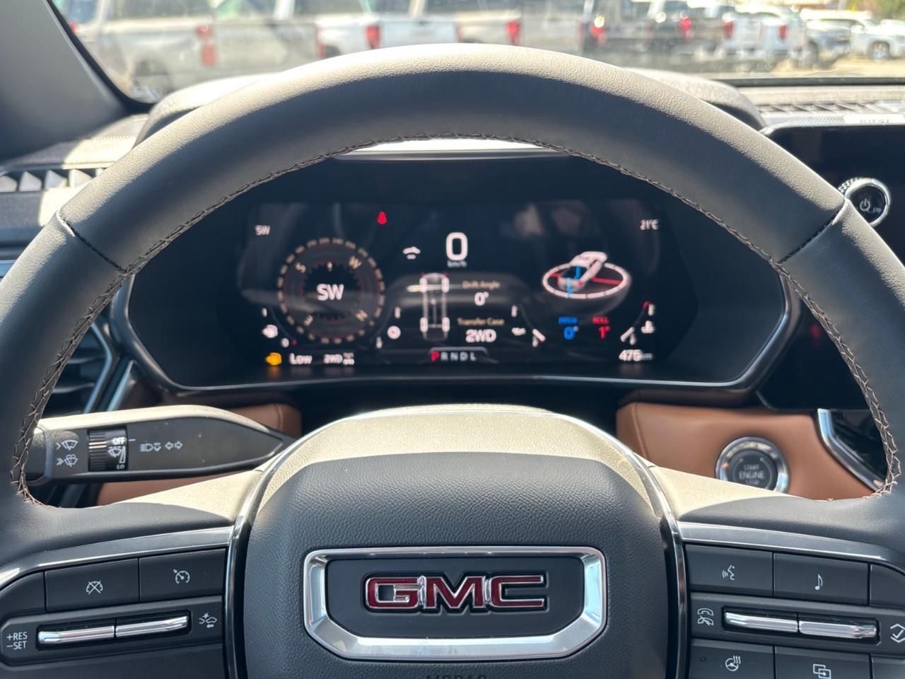 2026 GMC Canyon AT4 New 5 Passenger Mid Size 4X4 Truck with a Power Sunroof, Power Front Seats, Heated and Cooled Front Seats, Heated Steering Wheel, Adaptive Cruise Control, Heads Up Drivers Display, and a 11 Diagonal T Photo