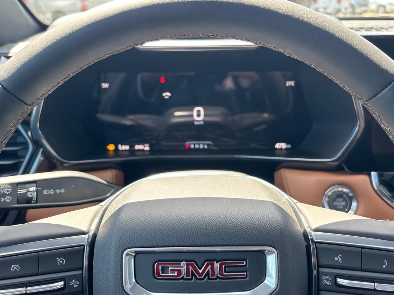 2026 GMC Canyon AT4 New 5 Passenger Mid Size 4X4 Truck with a Power Sunroof, Power Front Seats, Heated and Cooled Front Seats, Heated Steering Wheel, Adaptive Cruise Control, Heads Up Drivers Display, and a 11 Diagonal T Photo