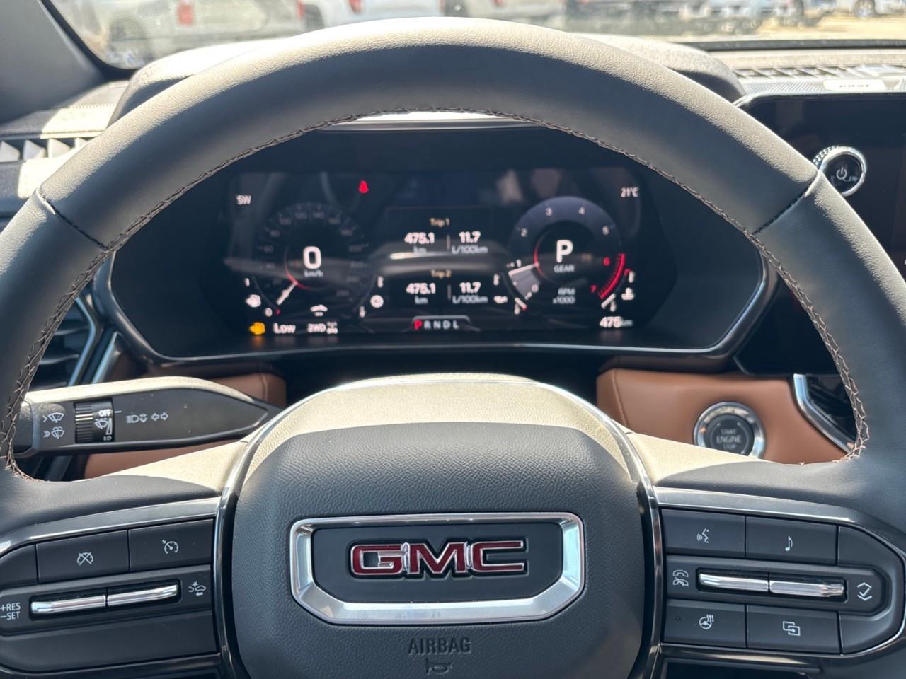 2026 GMC Canyon AT4 New 5 Passenger Mid Size 4X4 Truck with a Power Sunroof, Power Front Seats, Heated and Cooled Front Seats, Heated Steering Wheel, Adaptive Cruise Control, Heads Up Drivers Display, and a 11 Diagonal T Photo