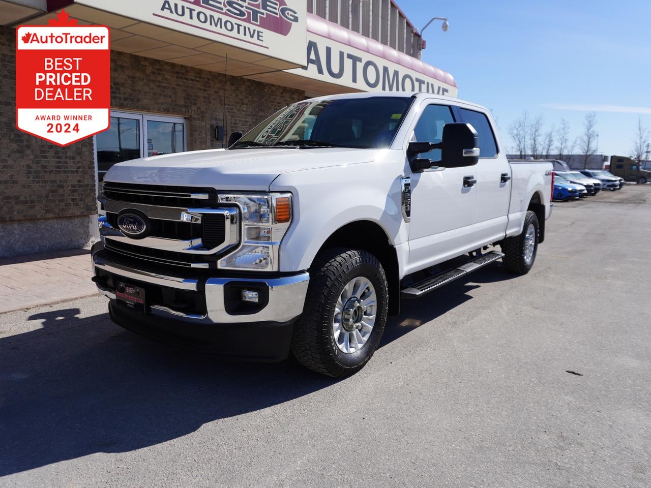 *** Dealer arranged financing on site! Quick, Simple,  no calls or waiting on bank appointments required!! Drive away today ***   NO ADMINISTRATION FEES!!
2020 Ford F-250 XLT Crew Cab 4x4 -- Third GEN Super Duty V8 Engine 6-Speed Automatic -- Up to 15,000 lbs. of Max Towing Capacity -- Back-Up Camera --
Full-length factory running boards -- Power driver seat -- Infotainment system -- Android Auto / Apple Car Play -- Satellite Radio -- Bluetooth phone connectivity -- Keyless entry -- Fog lights / Tow hooks -- 18-in Wheels - Full-length running boards - Factory integrated trailer brakes - Extending towing mirrors

Light aluminum ford body with updated front and rear styling, Bright Oxford white exterior.  Spacious Ford crew cab with room for up to 6 passengers and a large folding center console.  

Clean car fax, thoroughly serviced. Cared for a maintained.  Not your typical work truck.   

Features

- 6.2L 2-VALVE SOHC EFI NA V8 FLEX-FUEL
- 6 Passenger
- Back-Up Camera
- Power windows
- Power doors
- Power adjustable mirrors
- Power seat 
- Blind Spot Monitor
- Power pedals
- Bluetooth
- Sirius XM 
- 911 Assist
- Wifi capability 
- Voice Control
- Valet Mode
- USB A and USB C ports
- AdvanceTrac with Roll Stability Control
- 6 Airbags
- Keyless entry
- Android Auto/Apple CarPlay
- Tilt and telescopic steering wheel
- Audio and cruise controls on steering wheel
- Full-length factory running boards 
- 18-in wheels
- Chrome appearance package
- Upfitter switchesComes with a Manitoba Safety Certification, and we have many Extended Powertrain warranties available on your vehicle purchase up to 10-year coverage (on eligible vehicles see dealer for details). Financing on site with Zero down financing OAC. Trades accepted. View at Winnipeg West Automotive Group, 5195 Portage Ave. (only a couple of minutes past the new Costco) Dealer permit # 6007, Call now 1(888) 601-3023. This Car is located in Winnipeg Manitoba,  however we can have it shipped anywhere in North America relatively inexpensively.