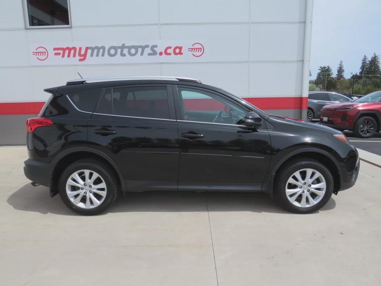 2014 Toyota RAV4 Limited | Clean Title No Accidents | AWD | Alloy Rims | Two Tone Leather | Sunroof | Navigation | Reverse Camera | Photo